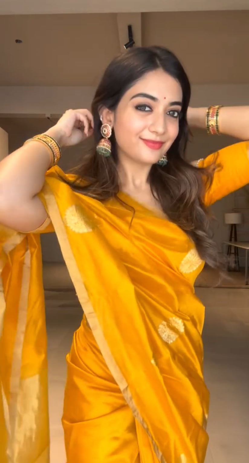 Yellow chanderi silk saree with mor motifs all over