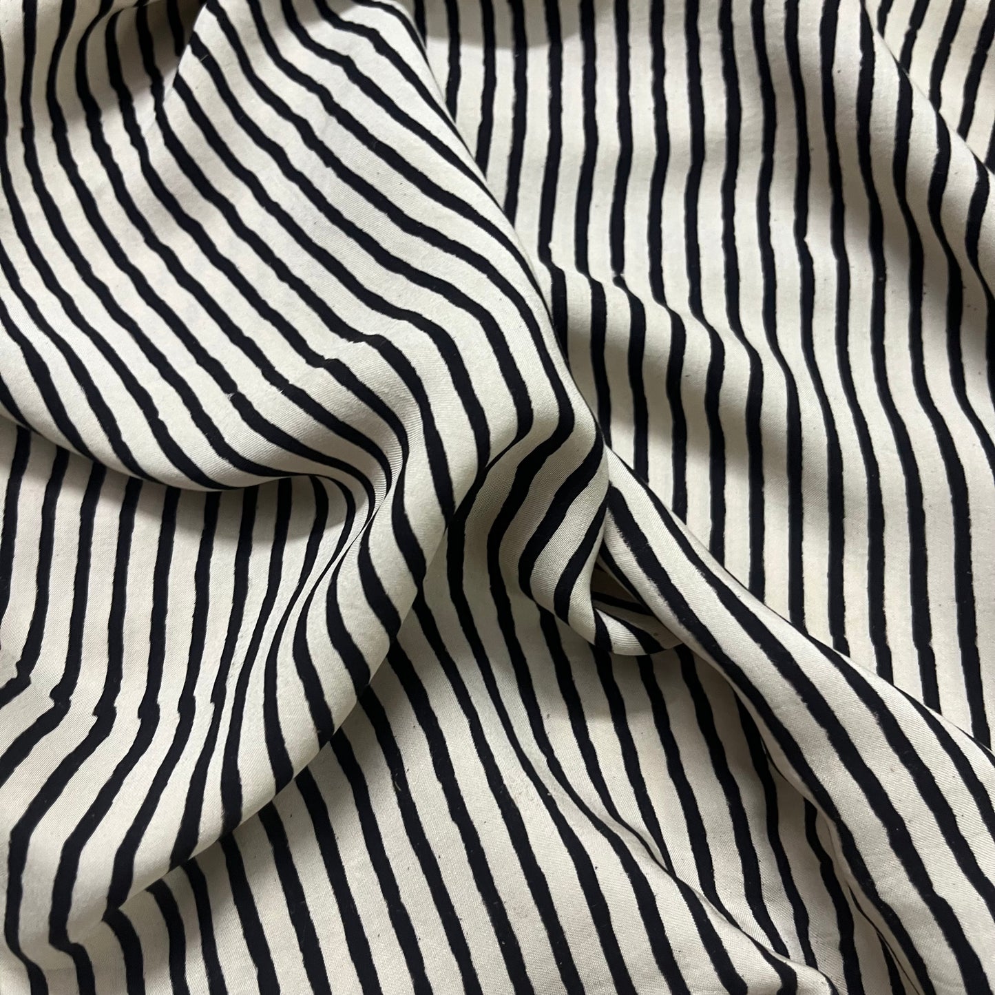 White and black silk saree with block print all over