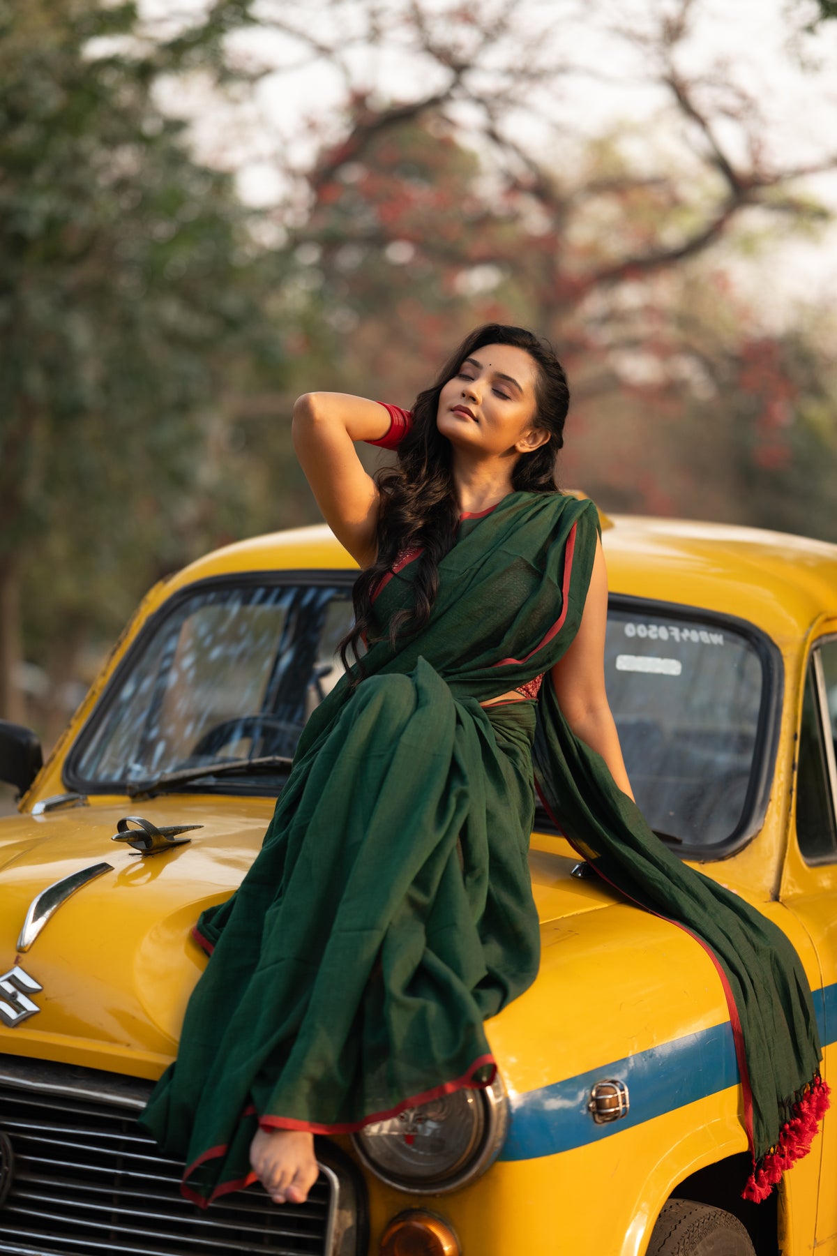 Dark green and red mulmul saree