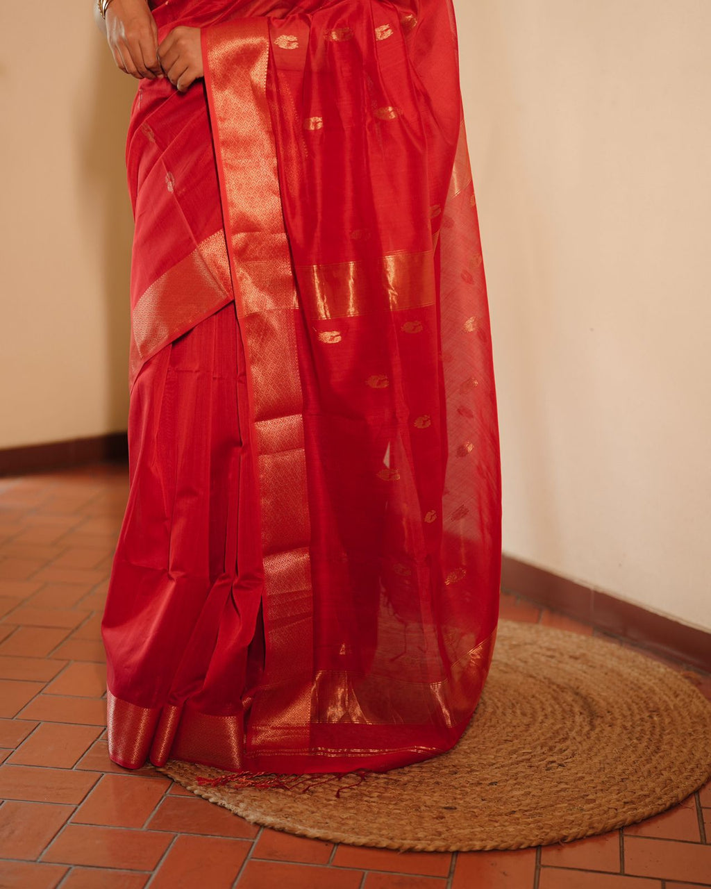 Red Maheshwari saree with morni motifs all over