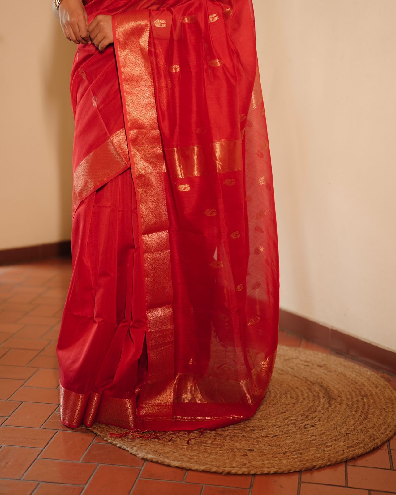 Red Maheshwari saree with morni motifs all over