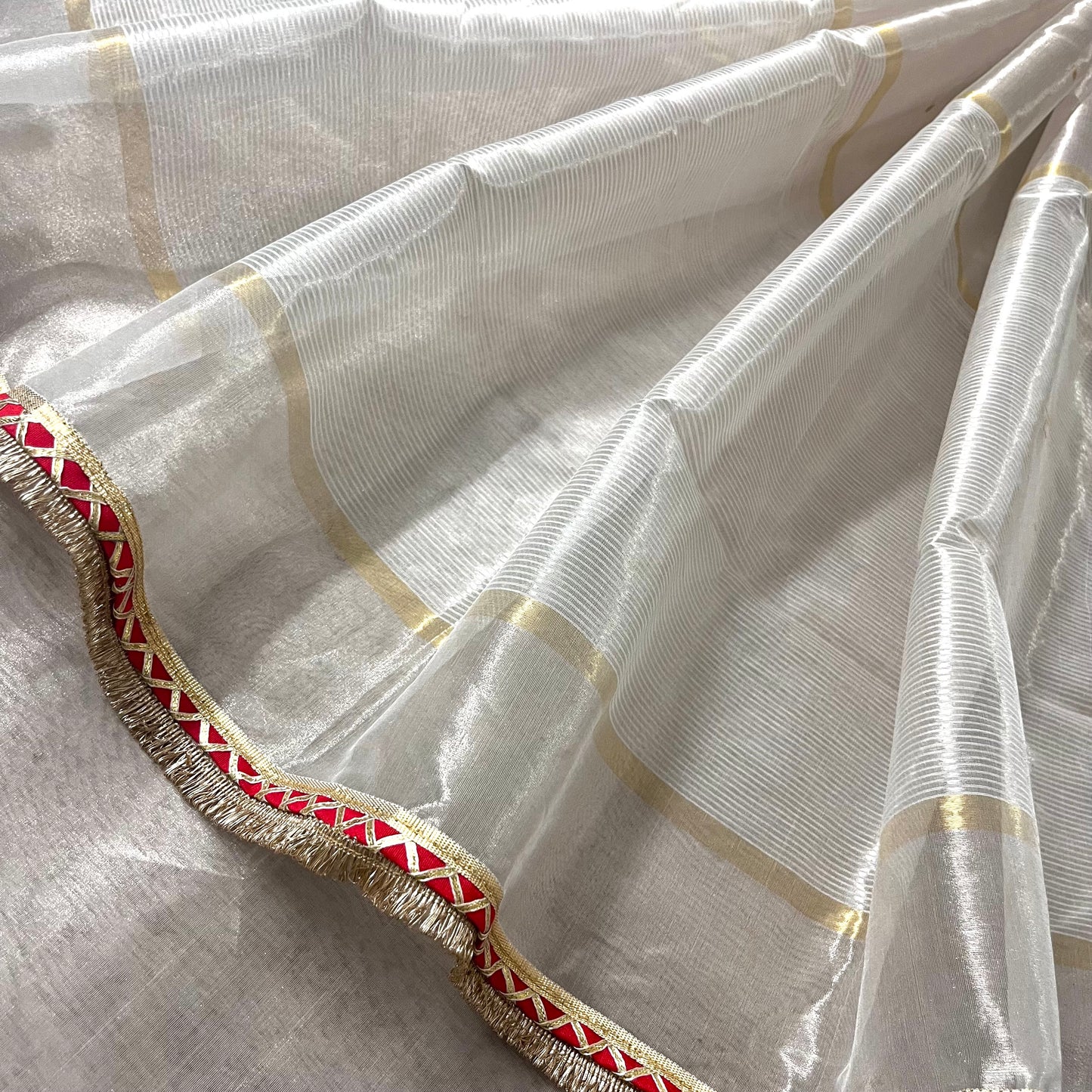 Off white and red Chanderi tissue silk saree with zari bootis all over