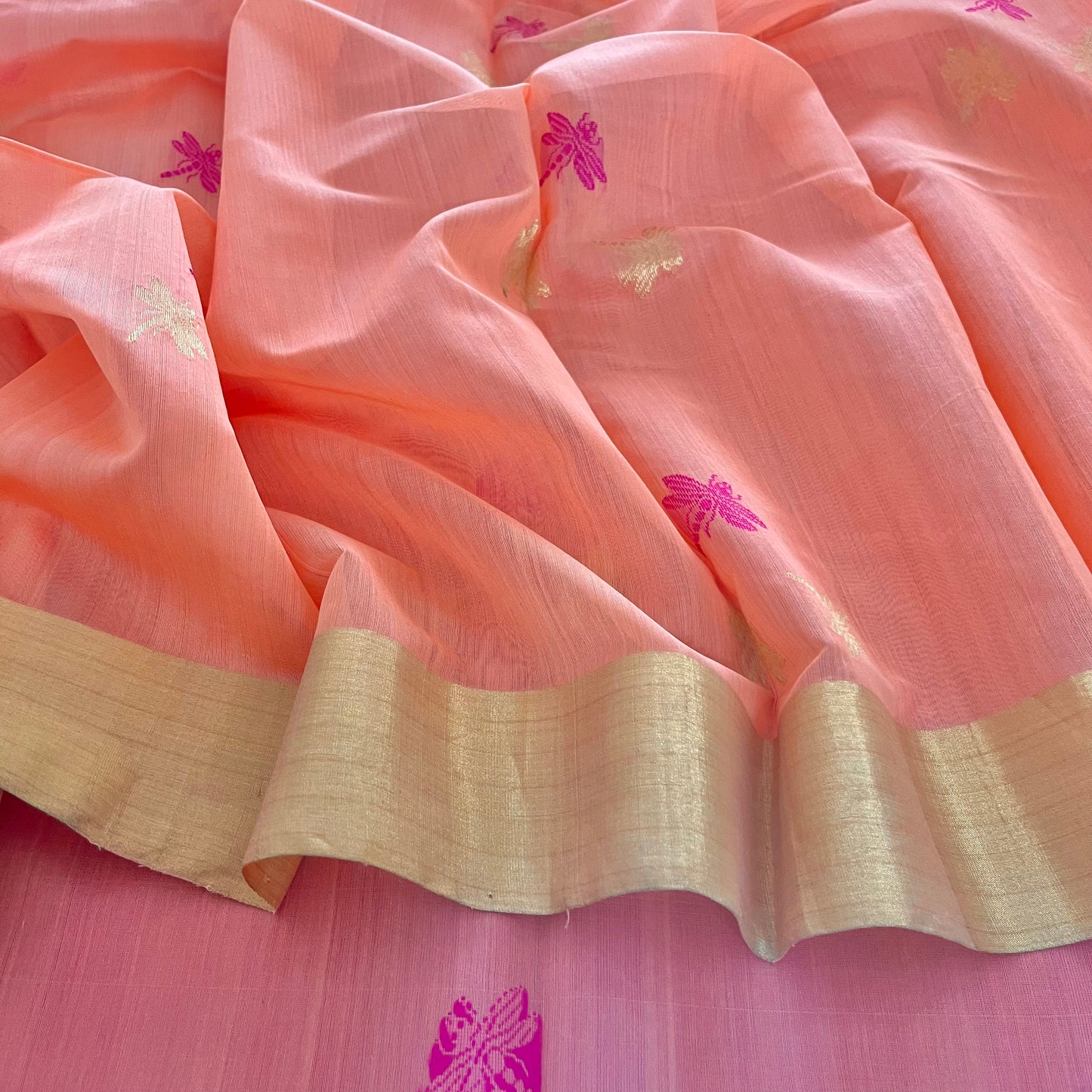 Peachish pink Chanderi silk saree with dragonfly motifs all over