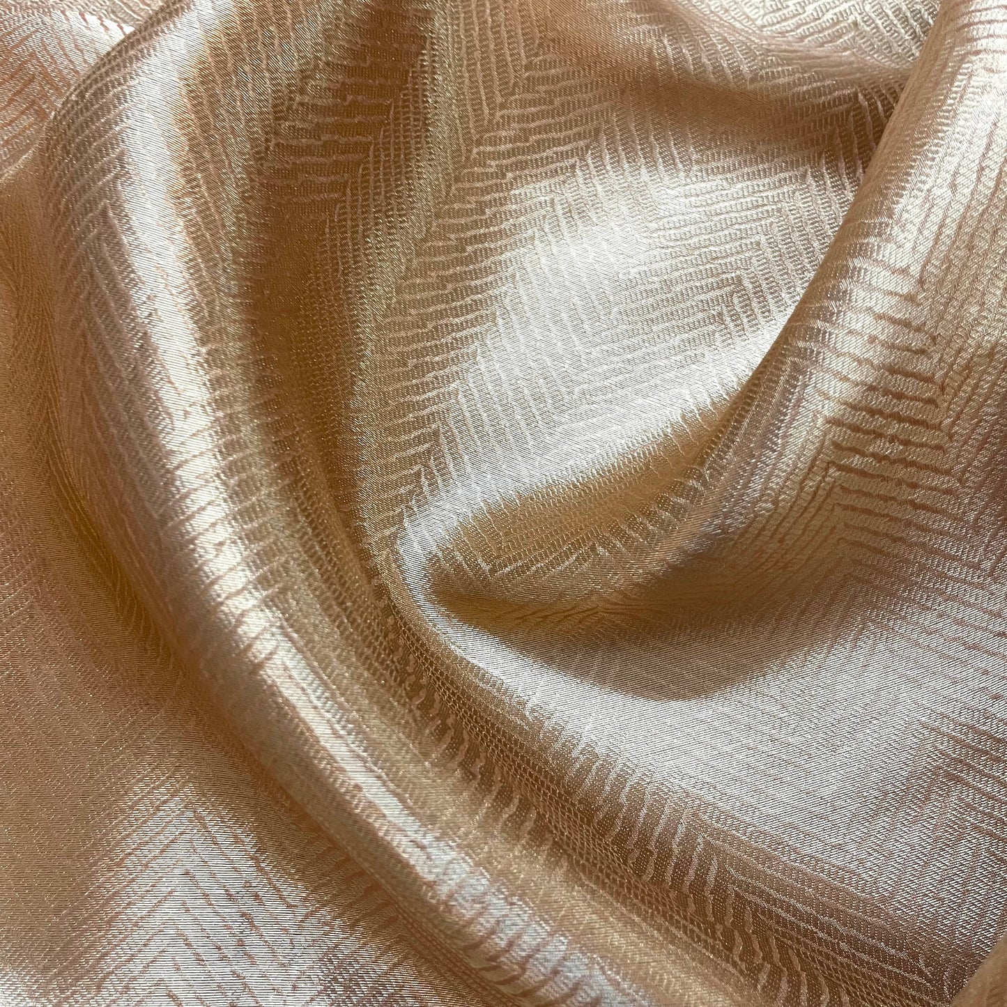 Champagne gold Banarasi silk saree with zari pattern all over