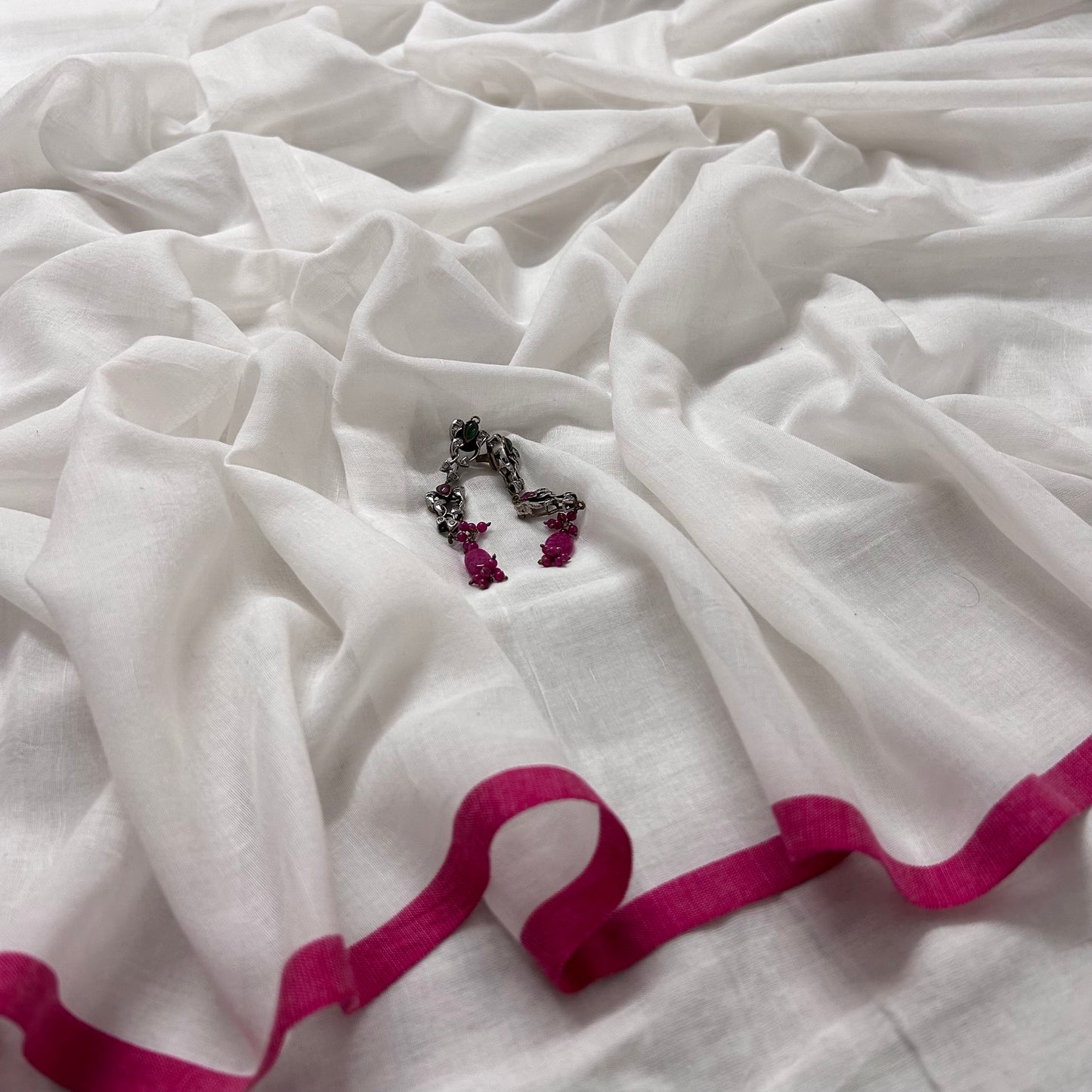 White and pink mulmul saree