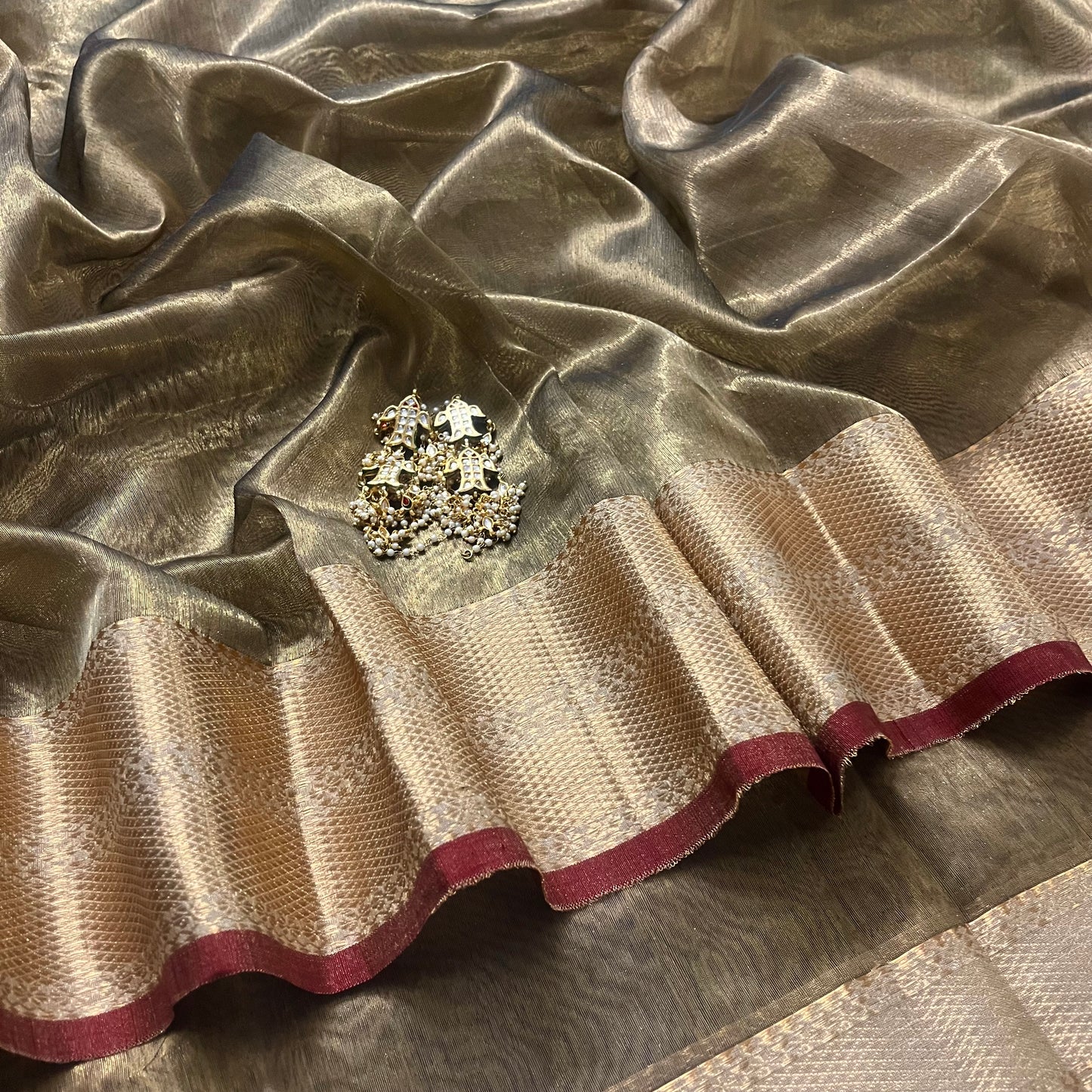 Antique gold and red Maheshwari tissue silk saree with zari pattern on pallu