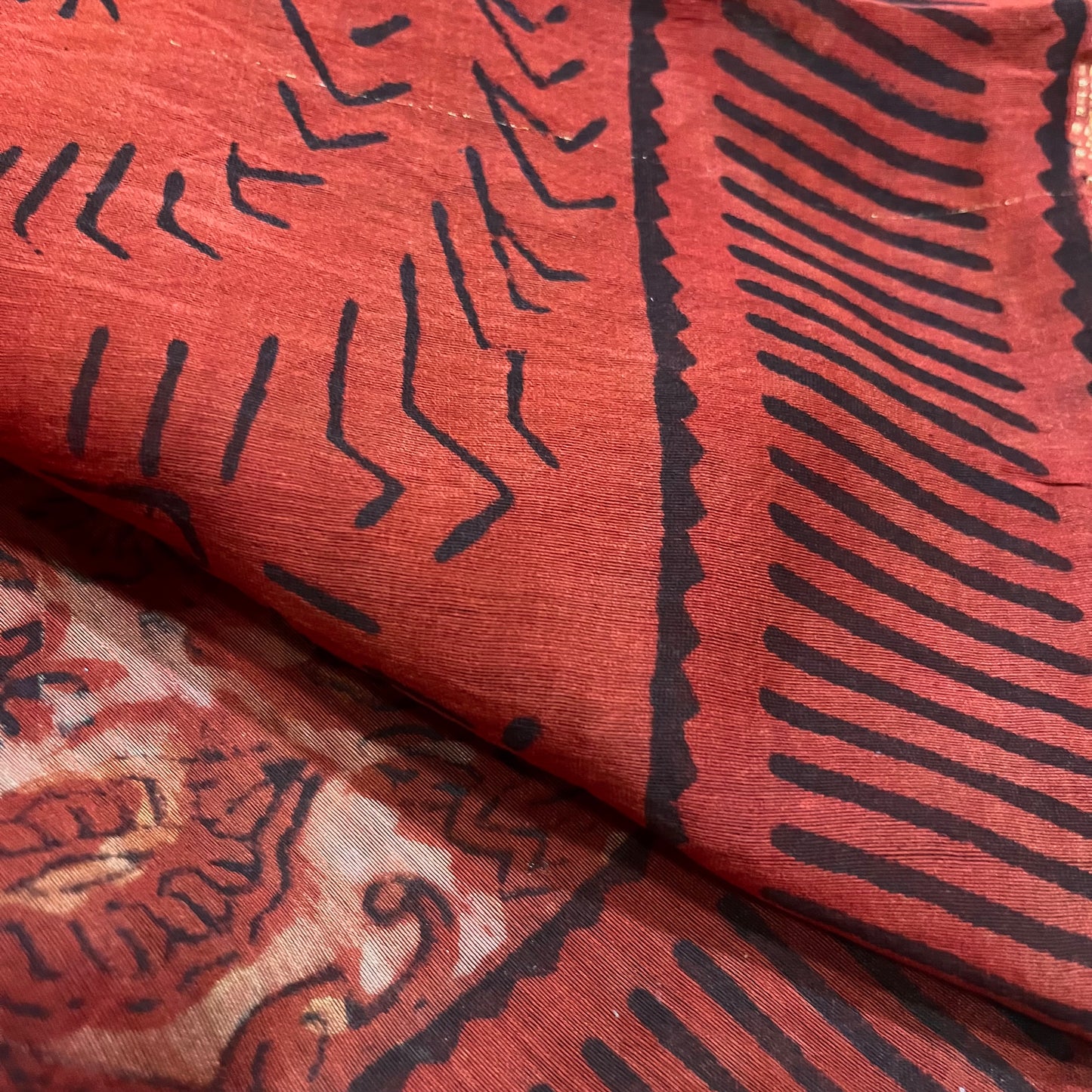 Rust Maheshwari saree with ajrakh print all over