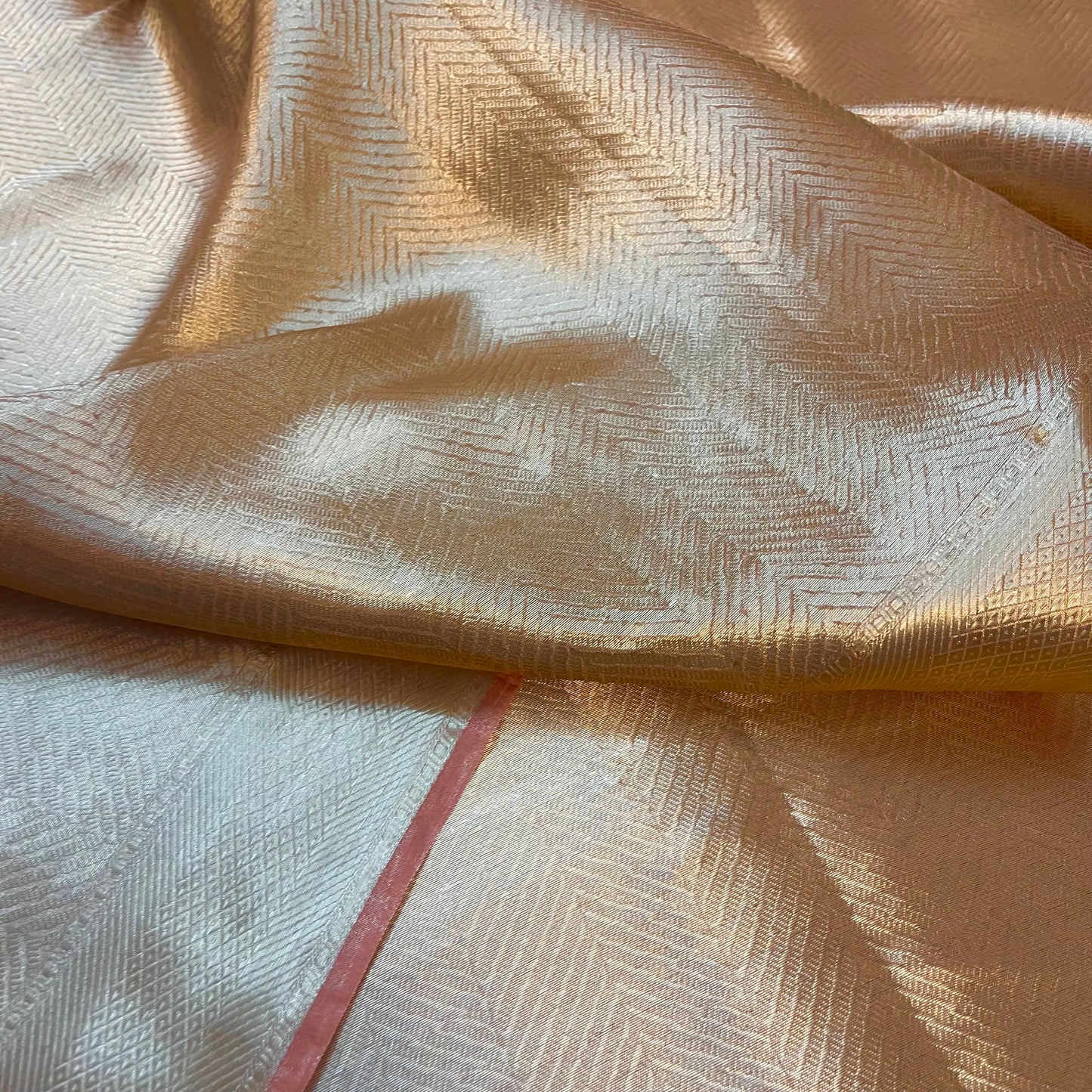 Champagne gold Banarasi silk saree with zari pattern all over