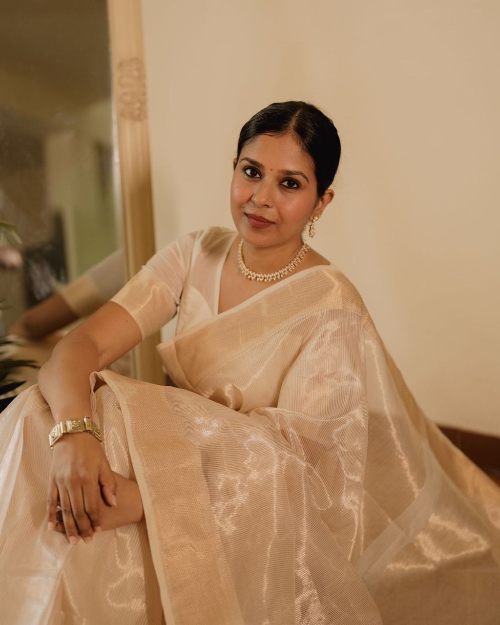 Off white gold Maheshwari saree with zari lines all over