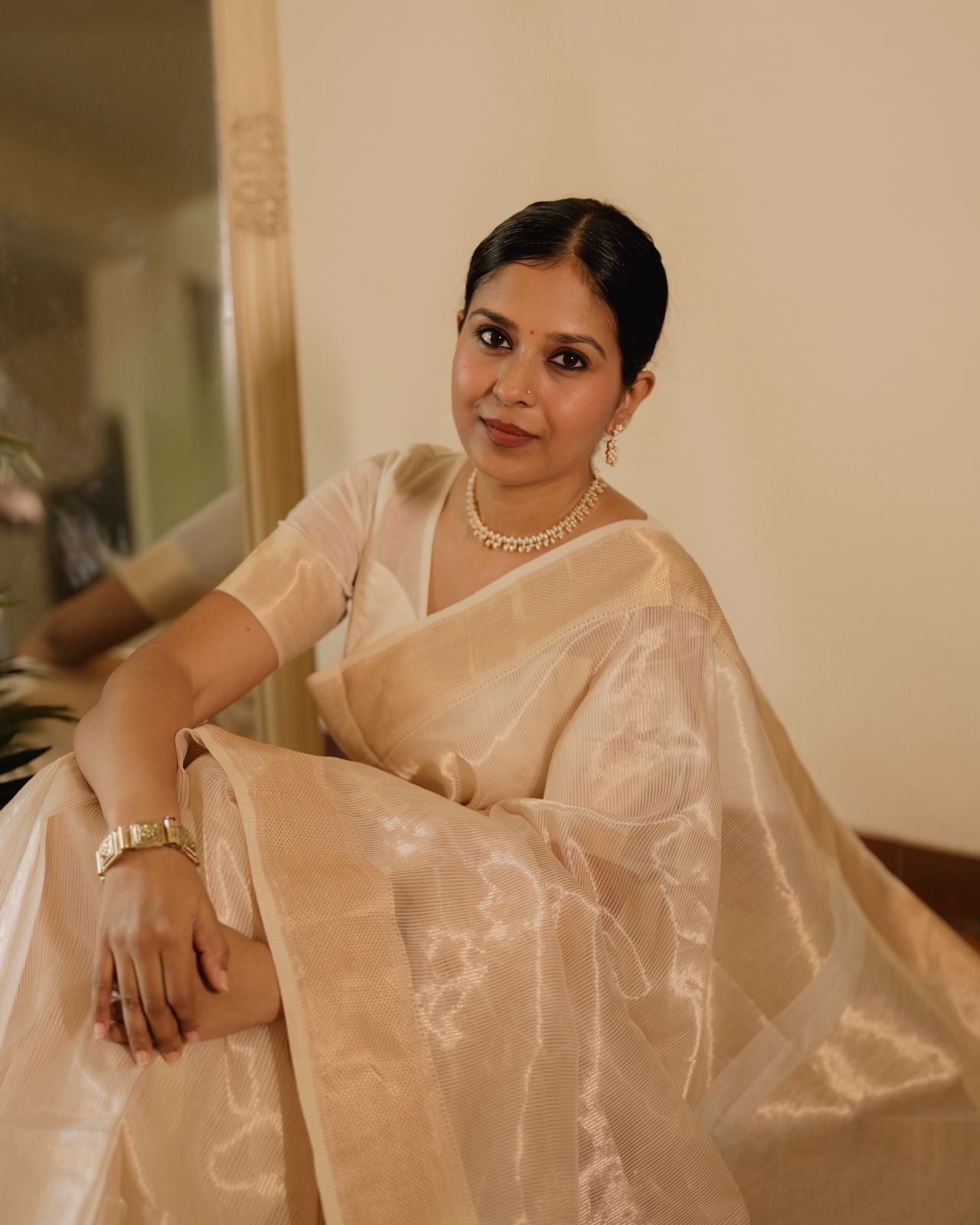 Off white gold Maheshwari saree with zari lines all over