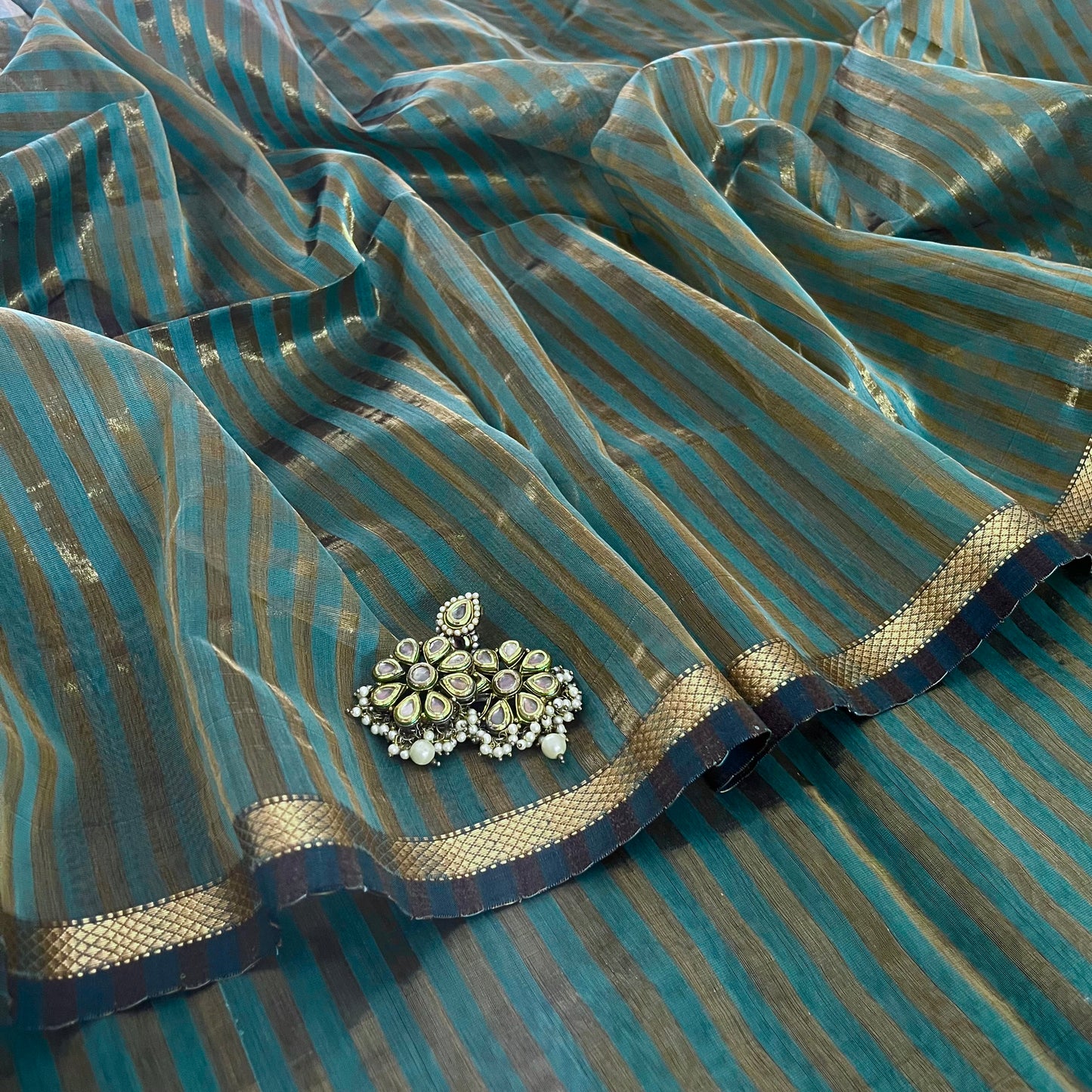 Baby blue Maheshwari saree with zari stripes all over
