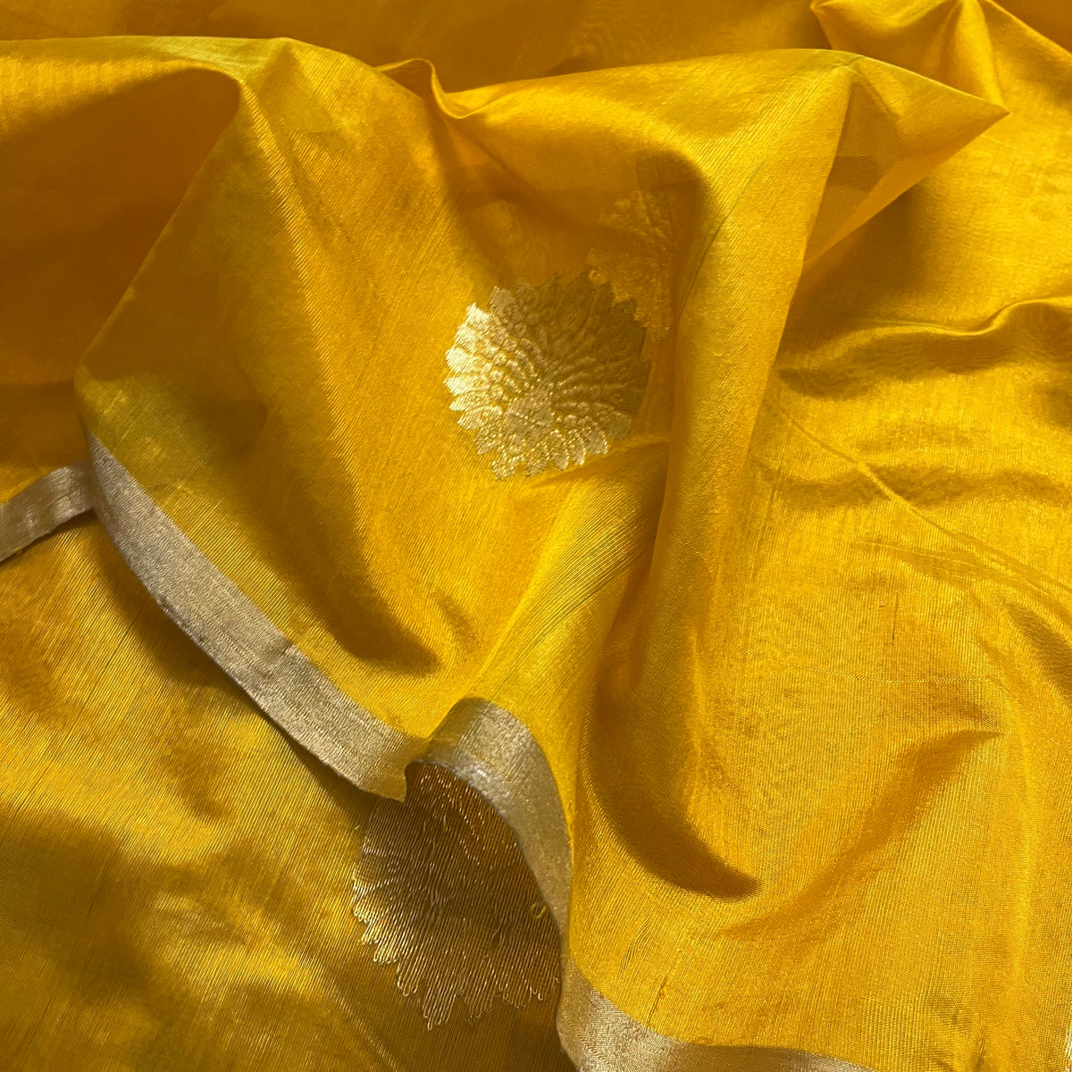 Yellow chanderi silk saree with mor motifs all over
