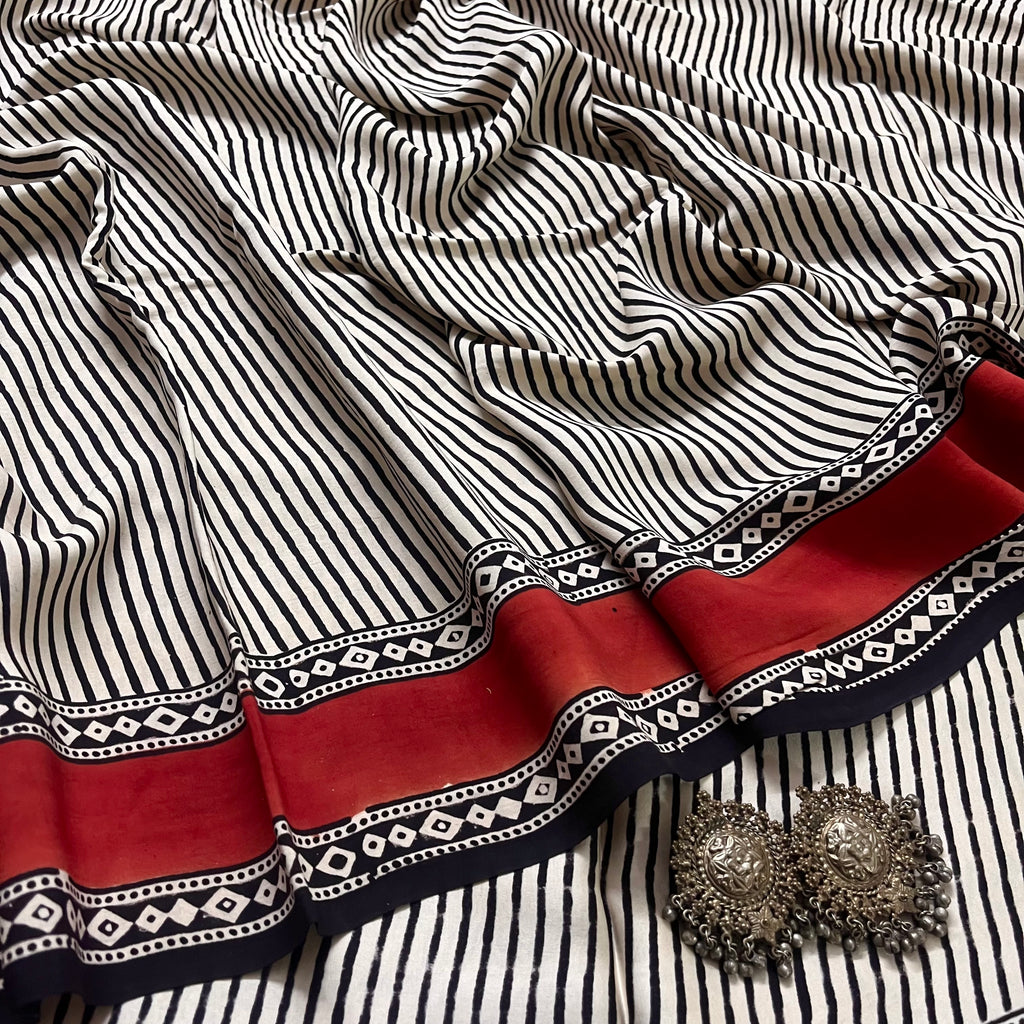 White and black silk saree with block print all over