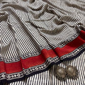 White and black silk saree with block print all over