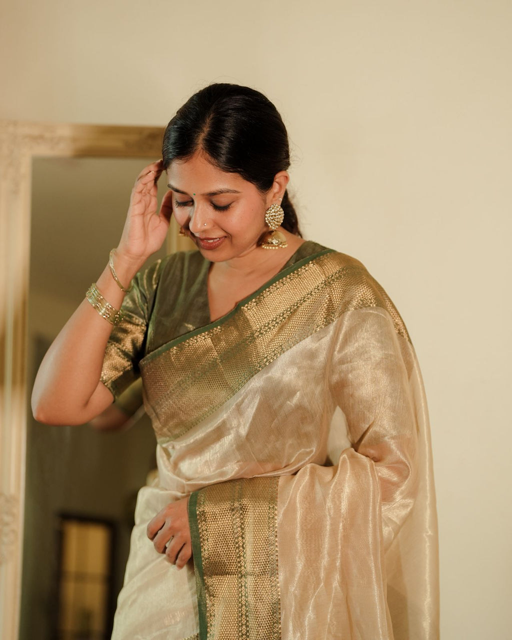 Cream Gold and green Maheshwari tissue silk saree with zari pattern on pallu