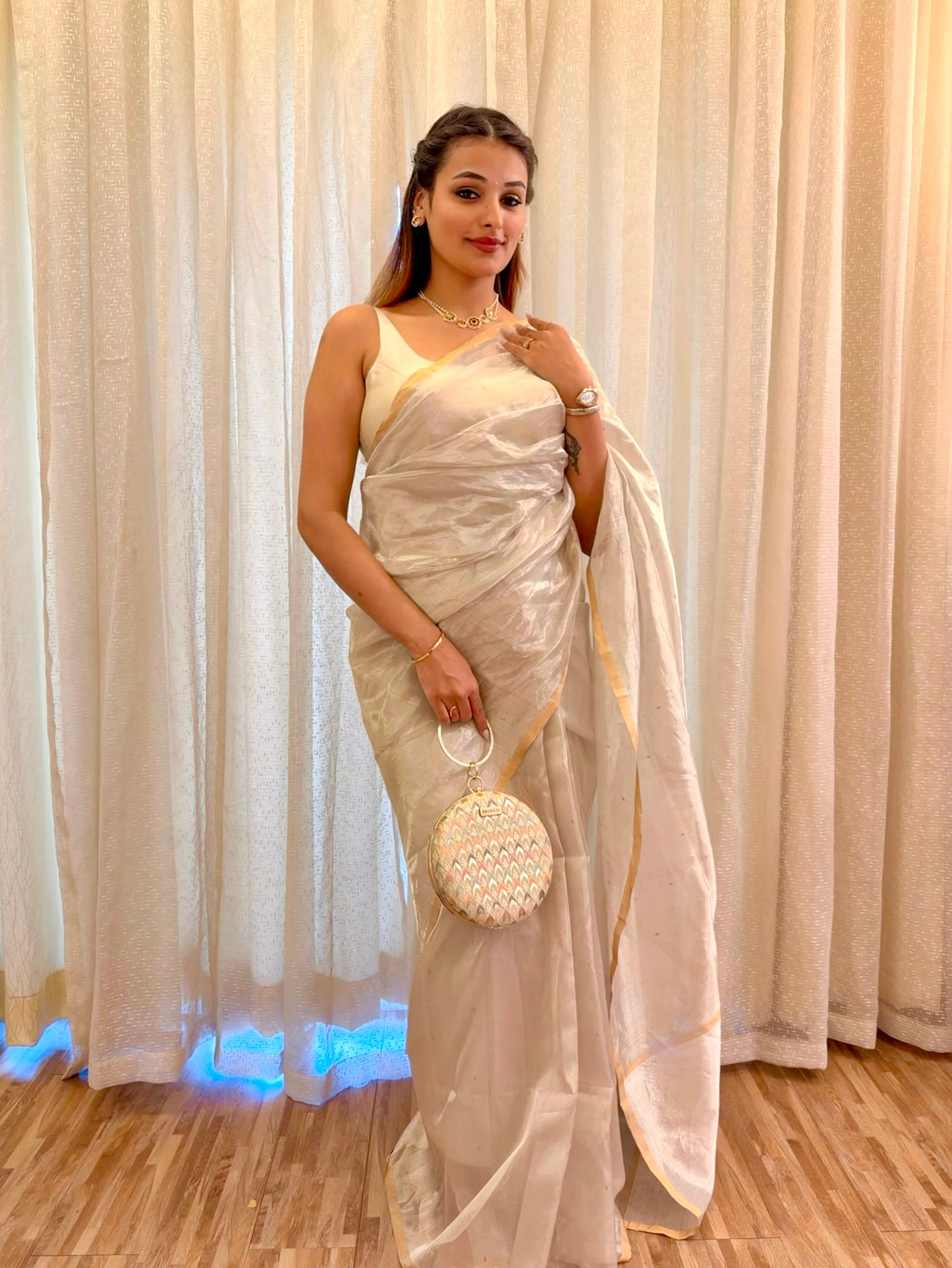 Chantilly cream Chanderi tissue silk saree with zari bootis all over