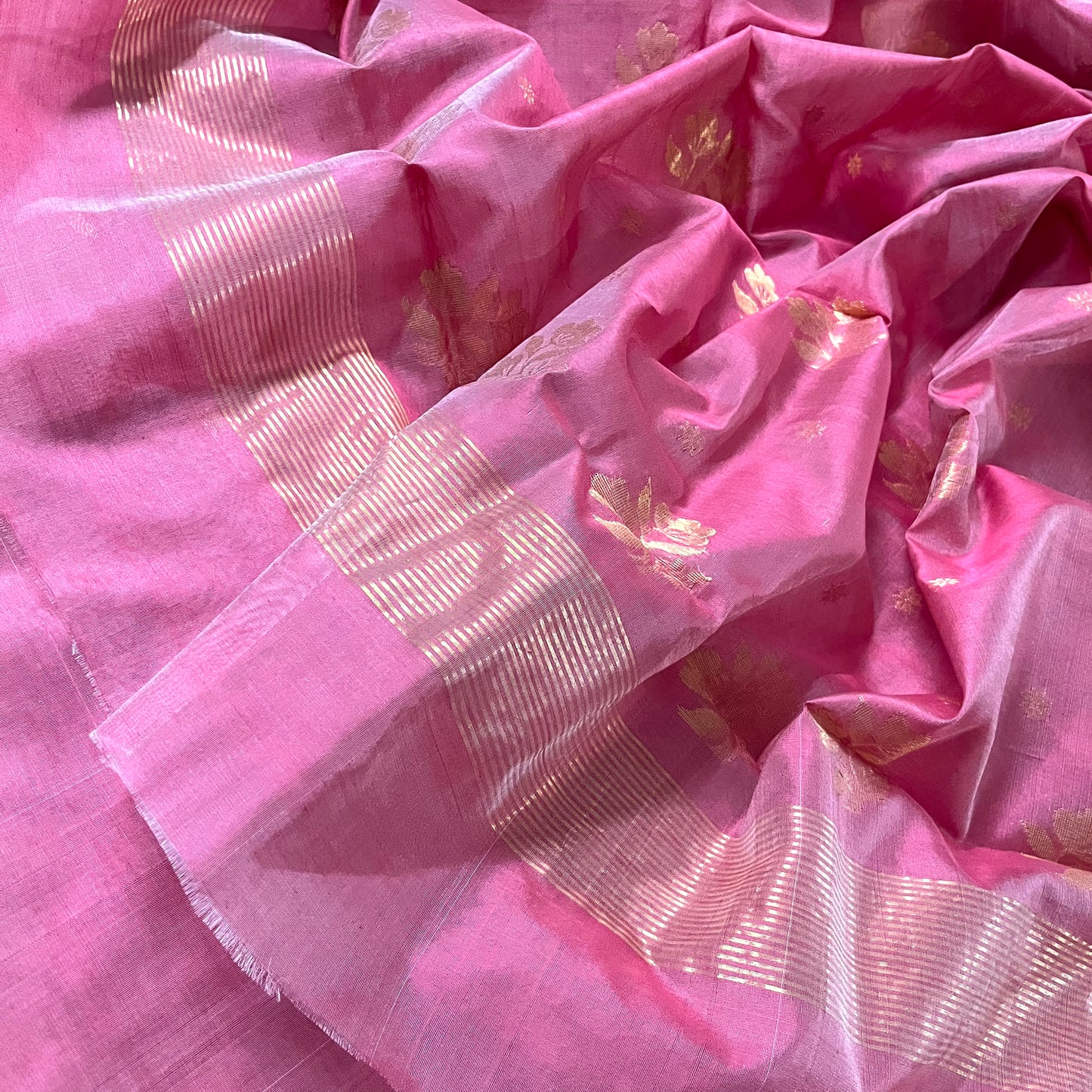 Rose pink Chanderi saree with zari bootis all over and flower motifs on pallu