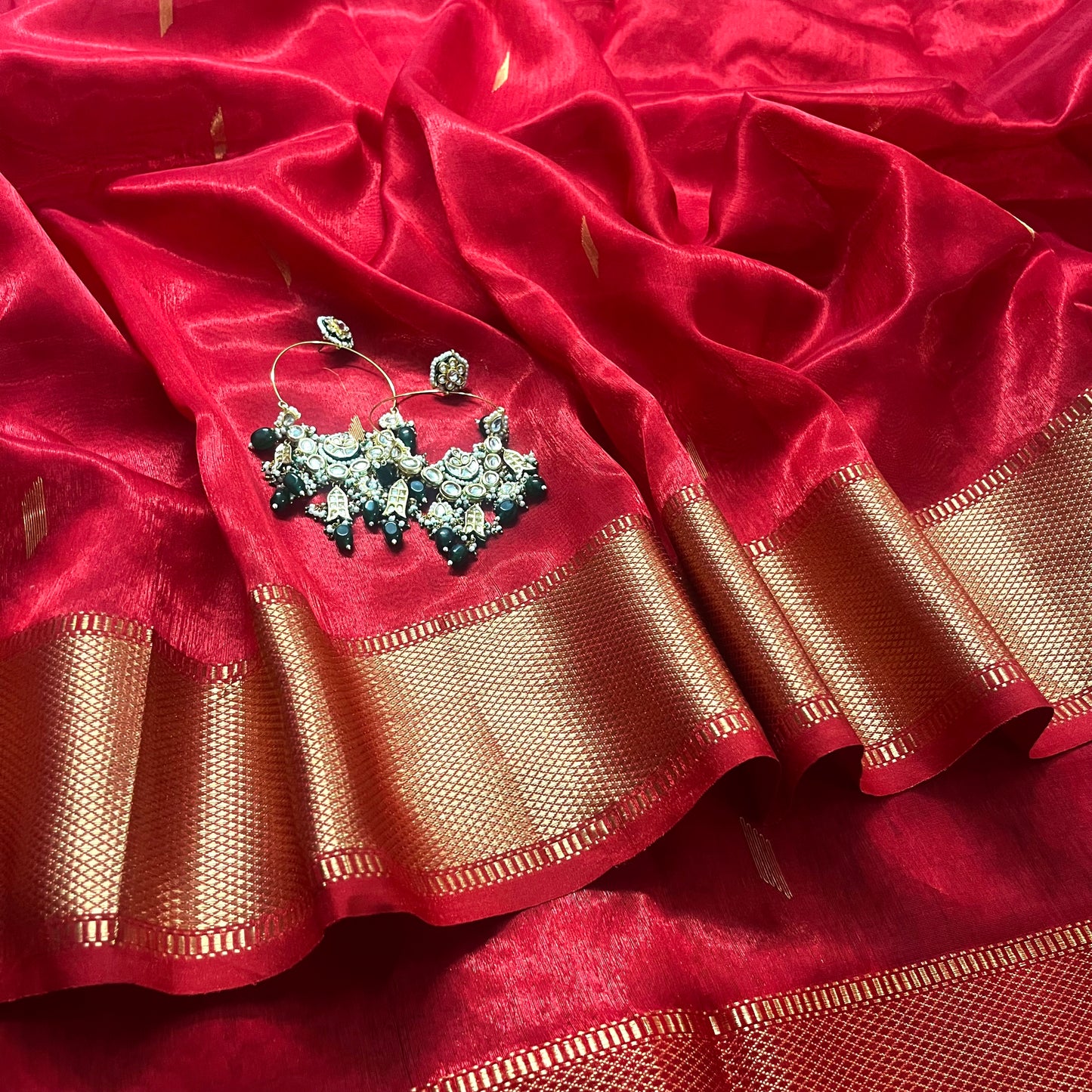 Red Maheshwari tissue silk saree with zari bootis all over