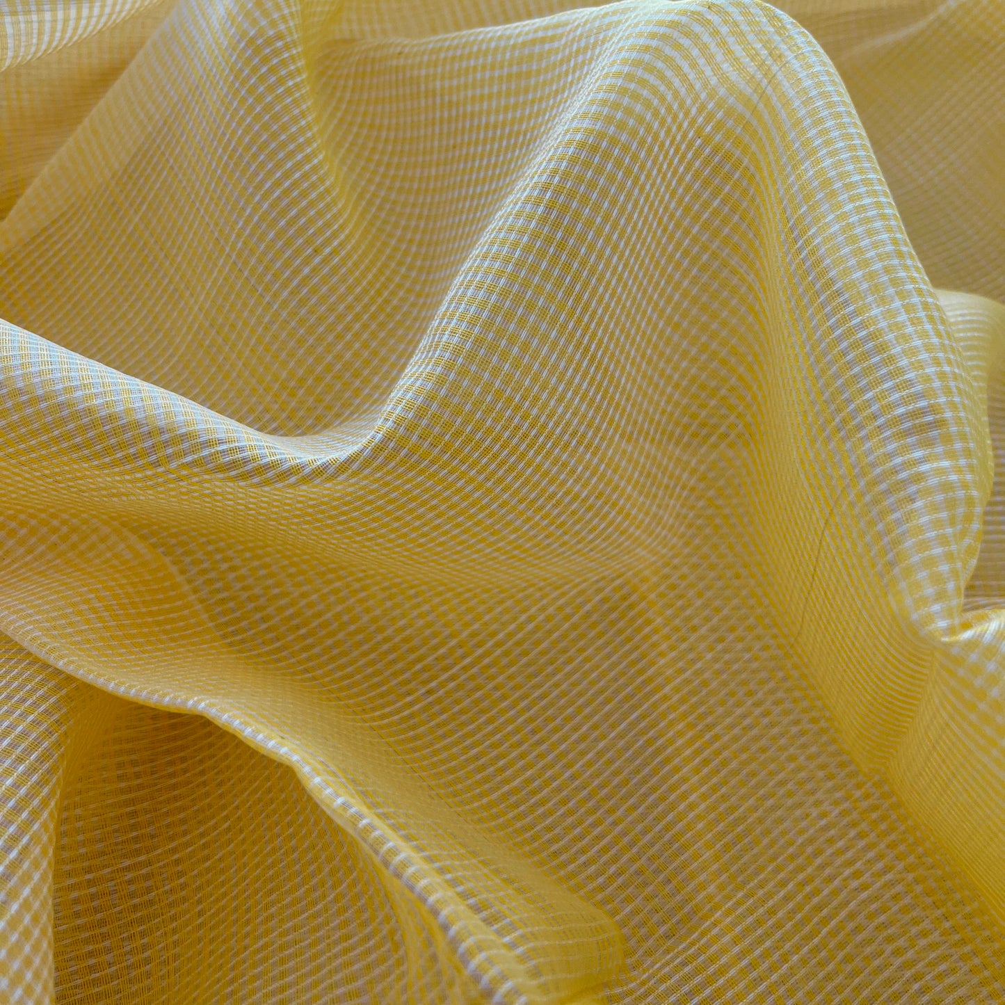 Yellow Maheshwari saree with silver zari border