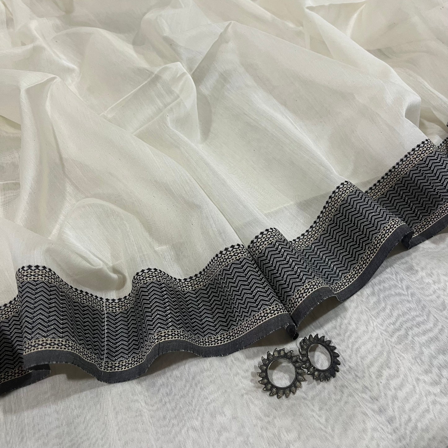 White and Black Maheshwari saree with resham border and Threadwork on pallu