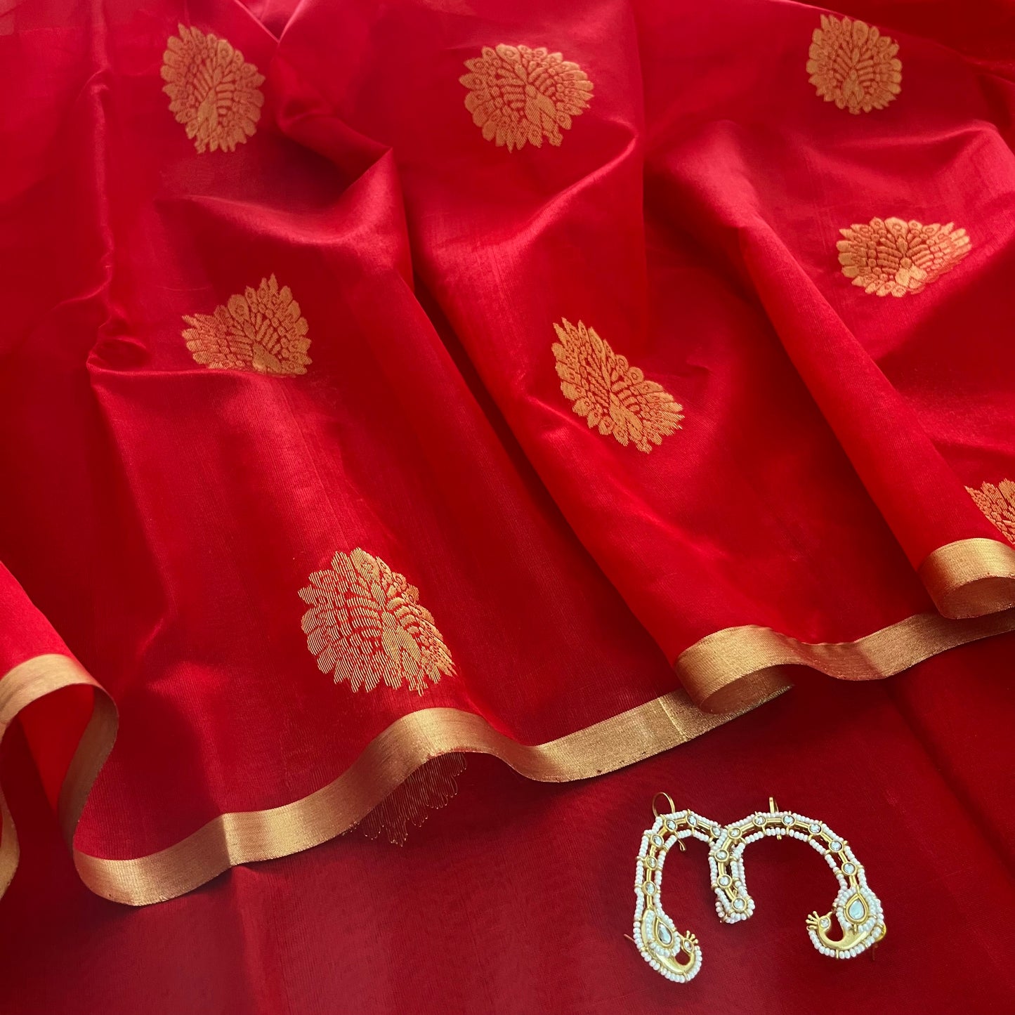Red Chanderi silk saree with mor motifs all over