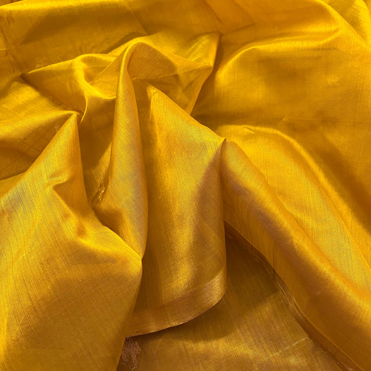 Mustard yellow chanderi silk saree with flower bootis all over