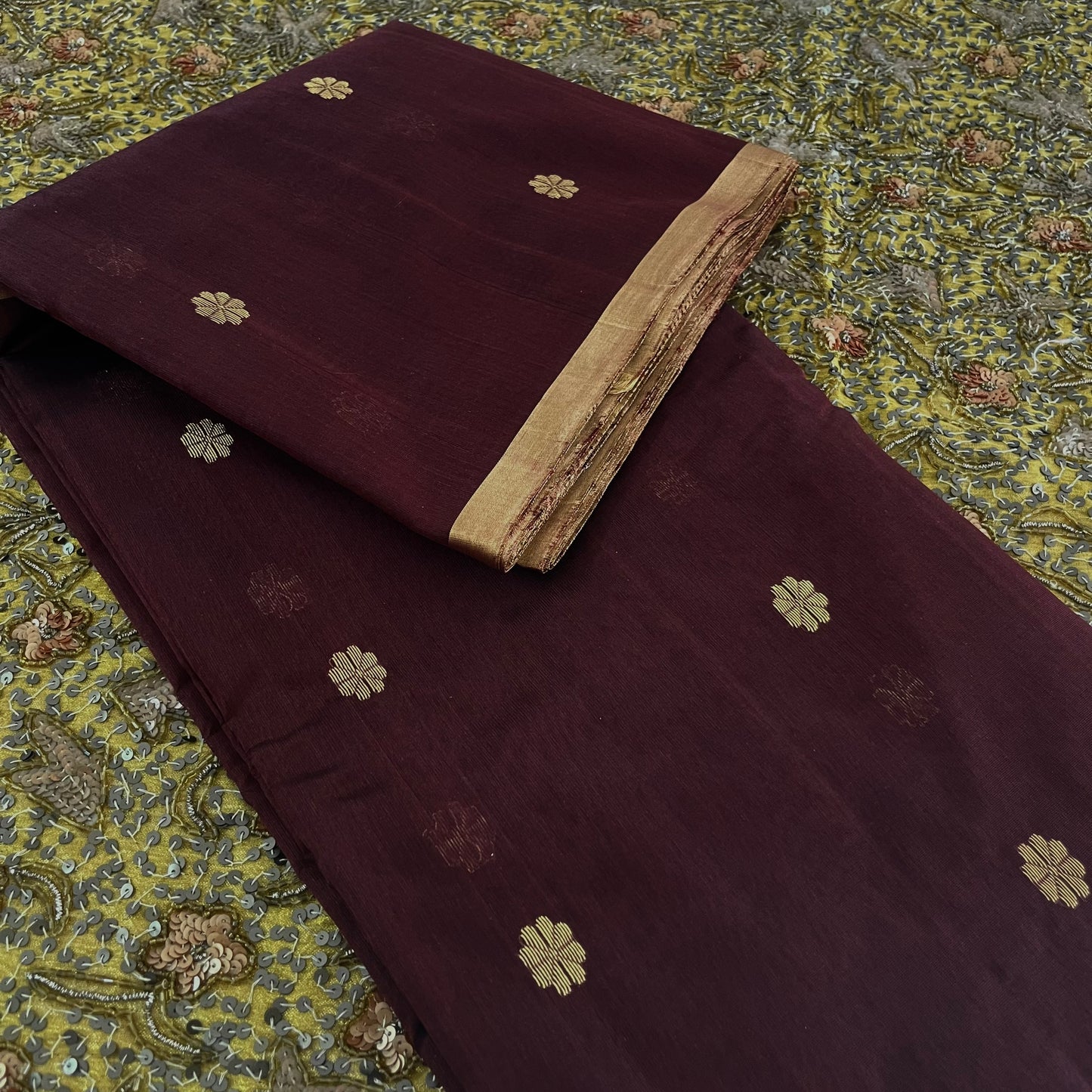 Mahogany Chanderi silk saree with flower bootis all over