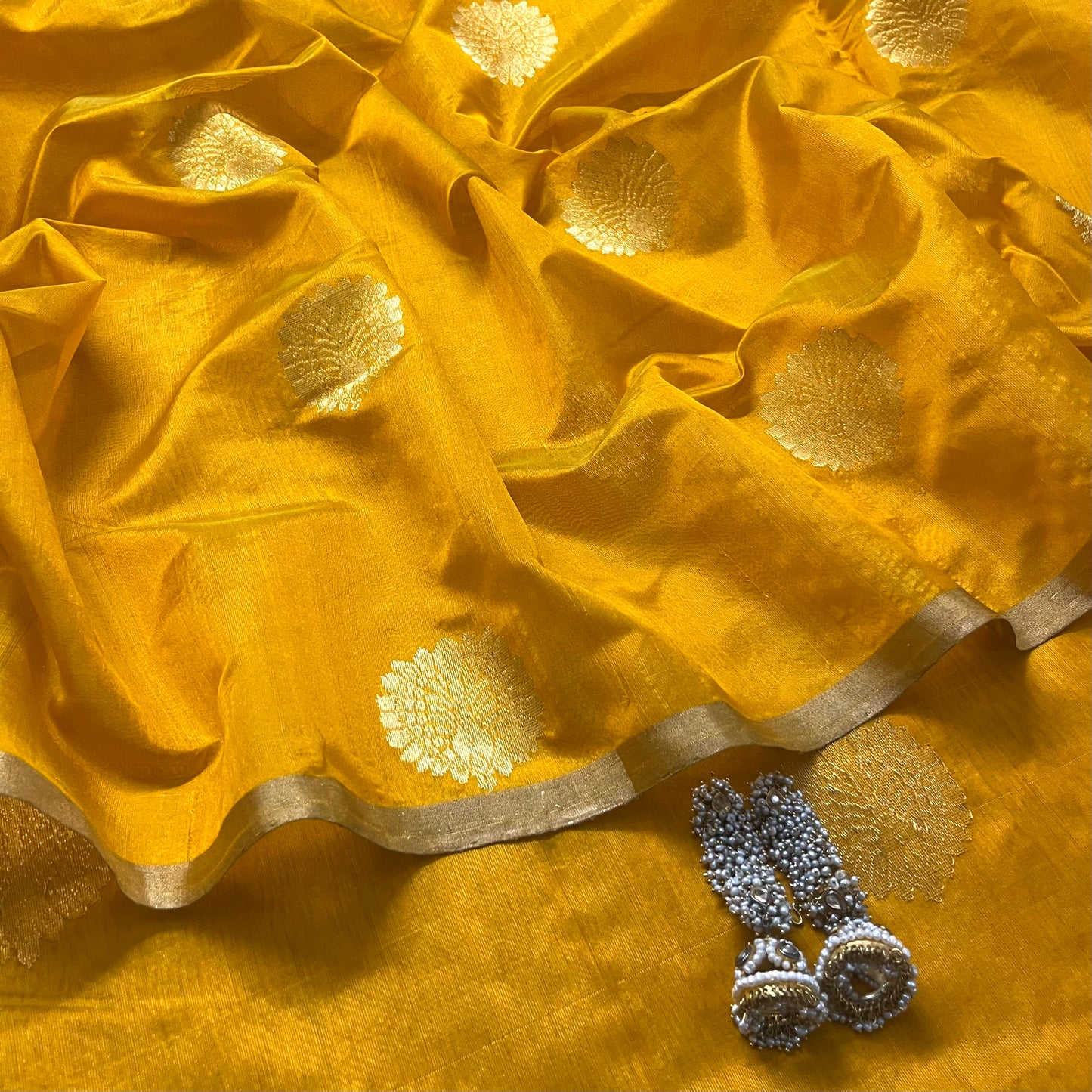 Yellow chanderi silk saree with mor motifs all over