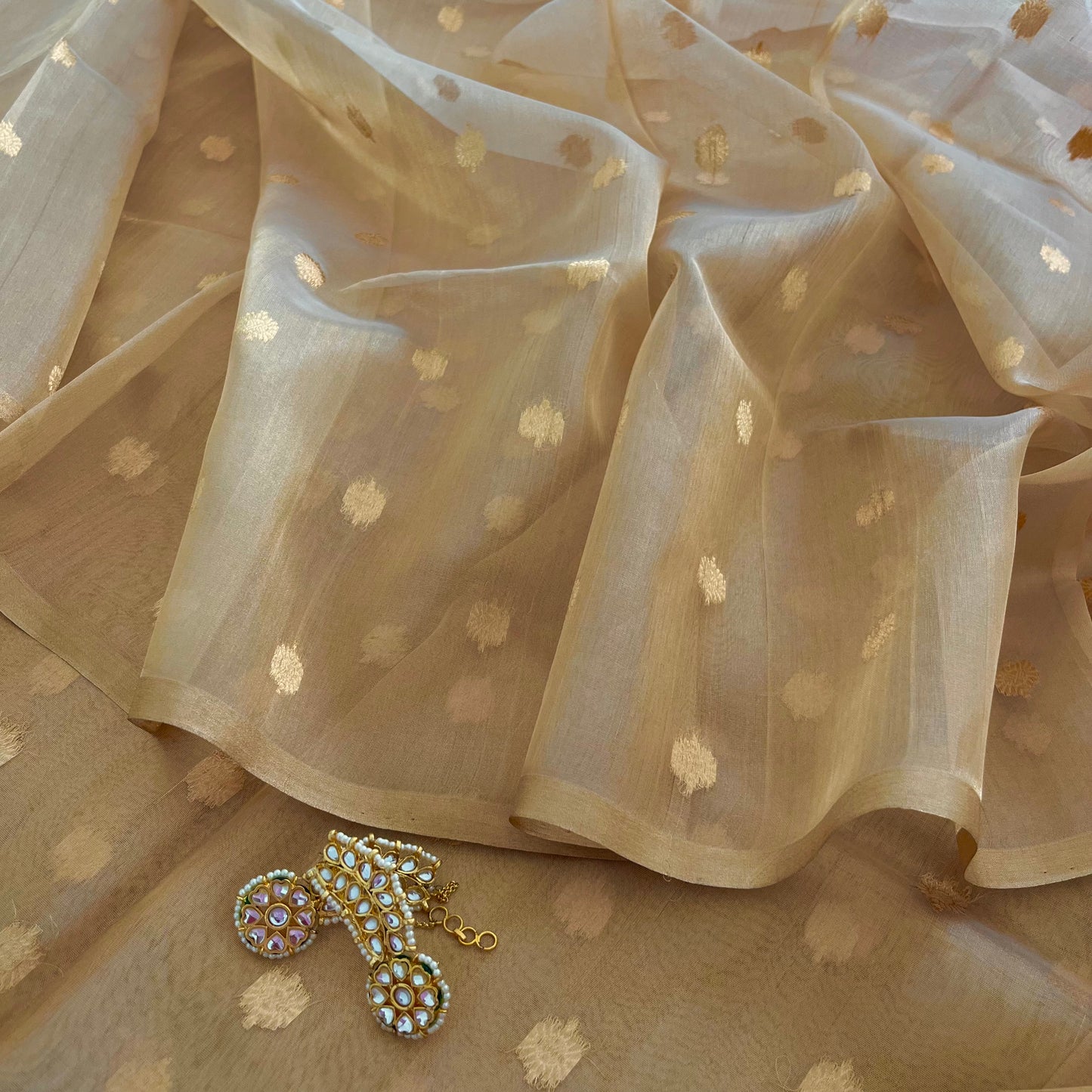 Gold Banarasi tissue silk saree with flower bootis all over