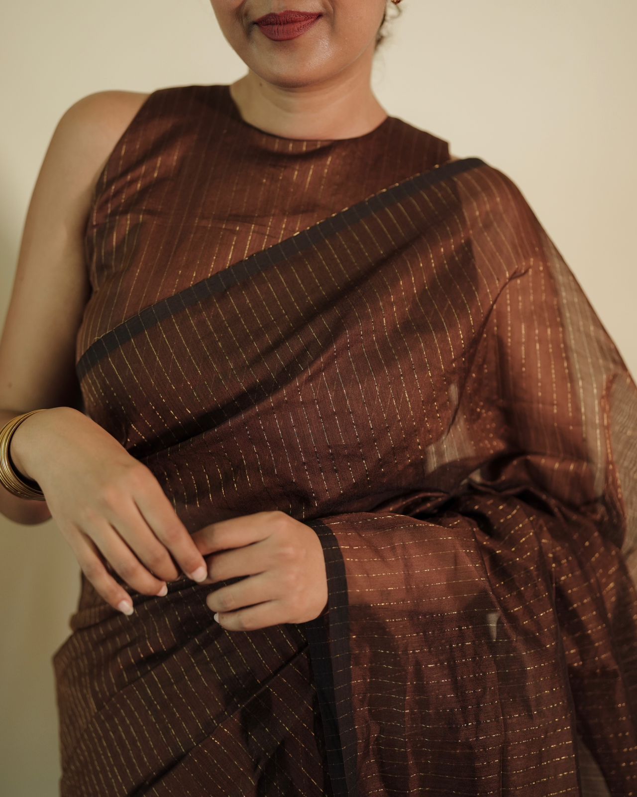 Chocolate brown Maheshwari saree with zari lines all over