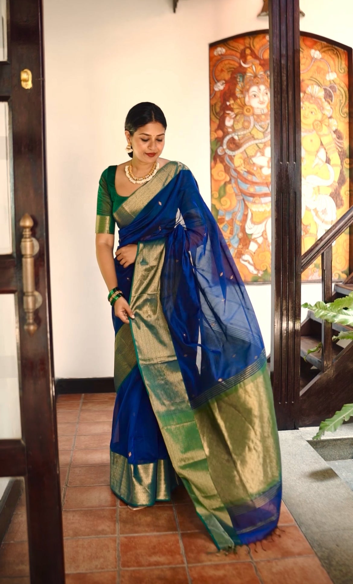 Dark blue & green maheshwari saree with zari pattern on pallu