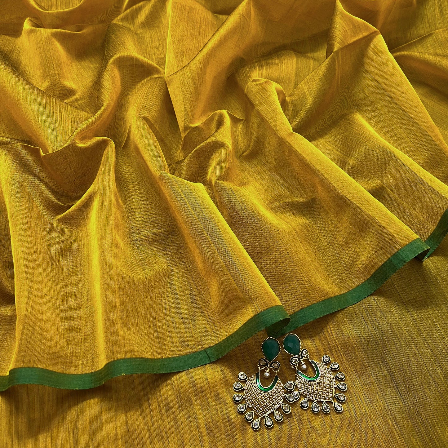 Mustard and green maheshwari saree