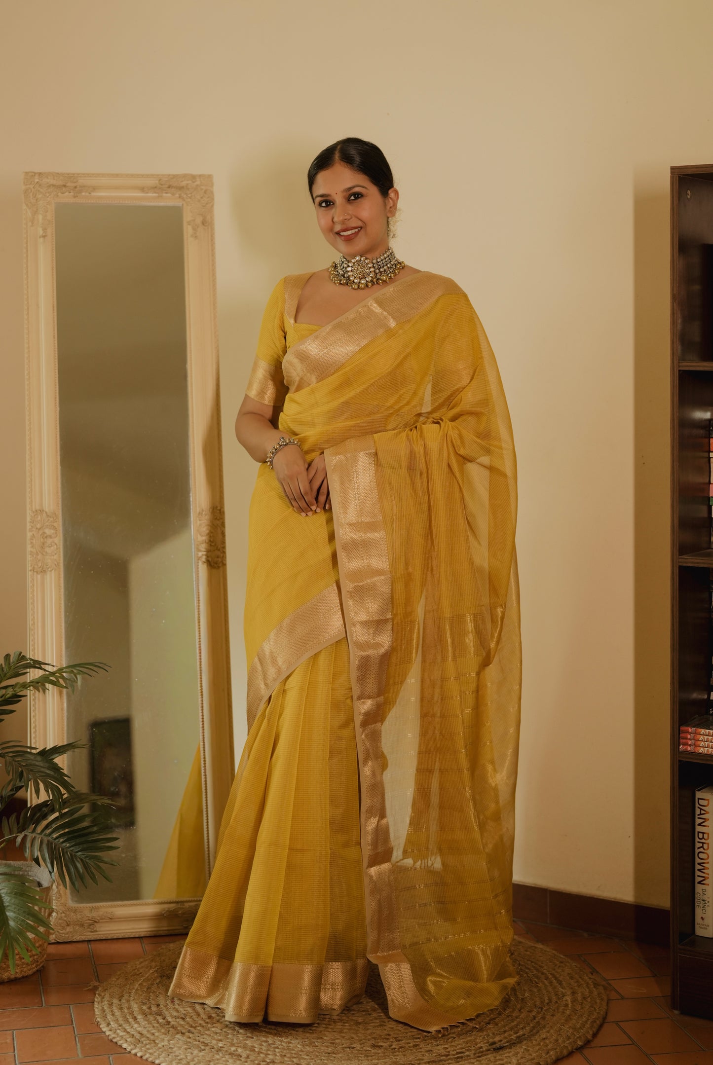 Yellow Maheshwari saree with zari lines all over