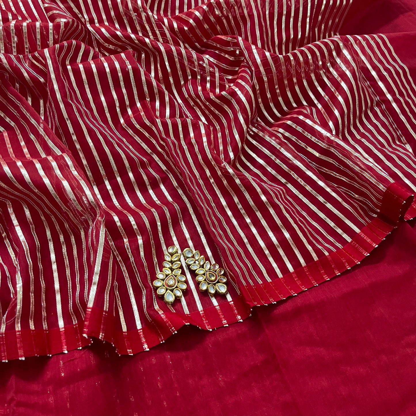 Deep red chanderi saree with intricate gota work all over