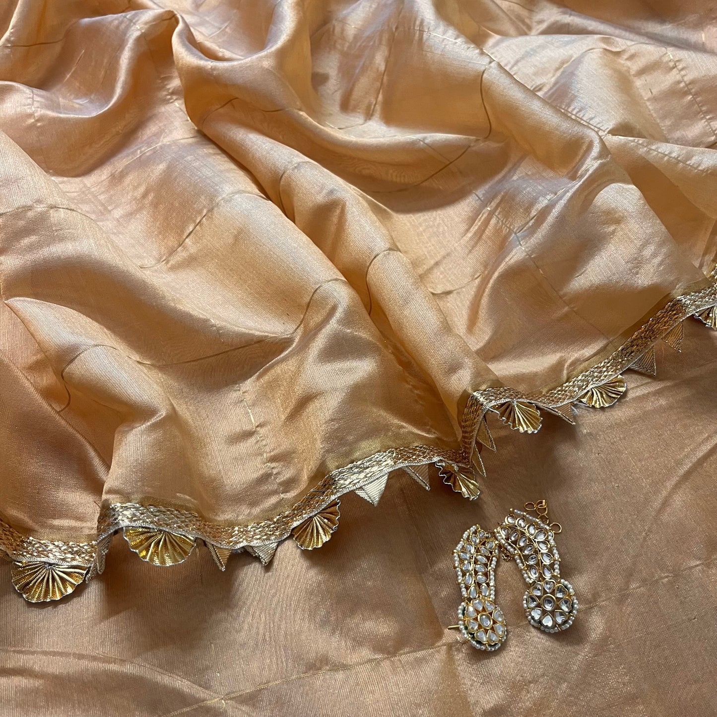 Sand beige Chanderi silk saree with zari checks all over and gota border