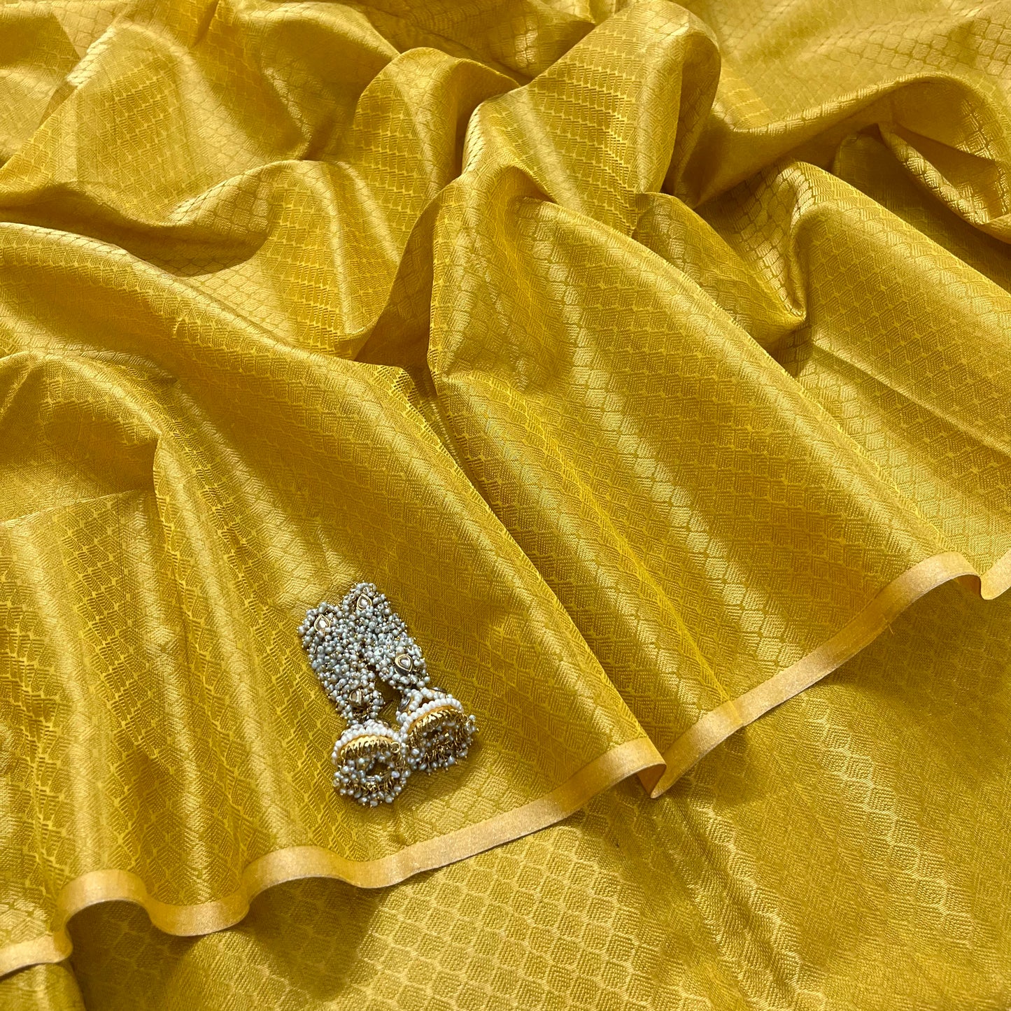 Amber gold maheshwari saree with zari pattern all over