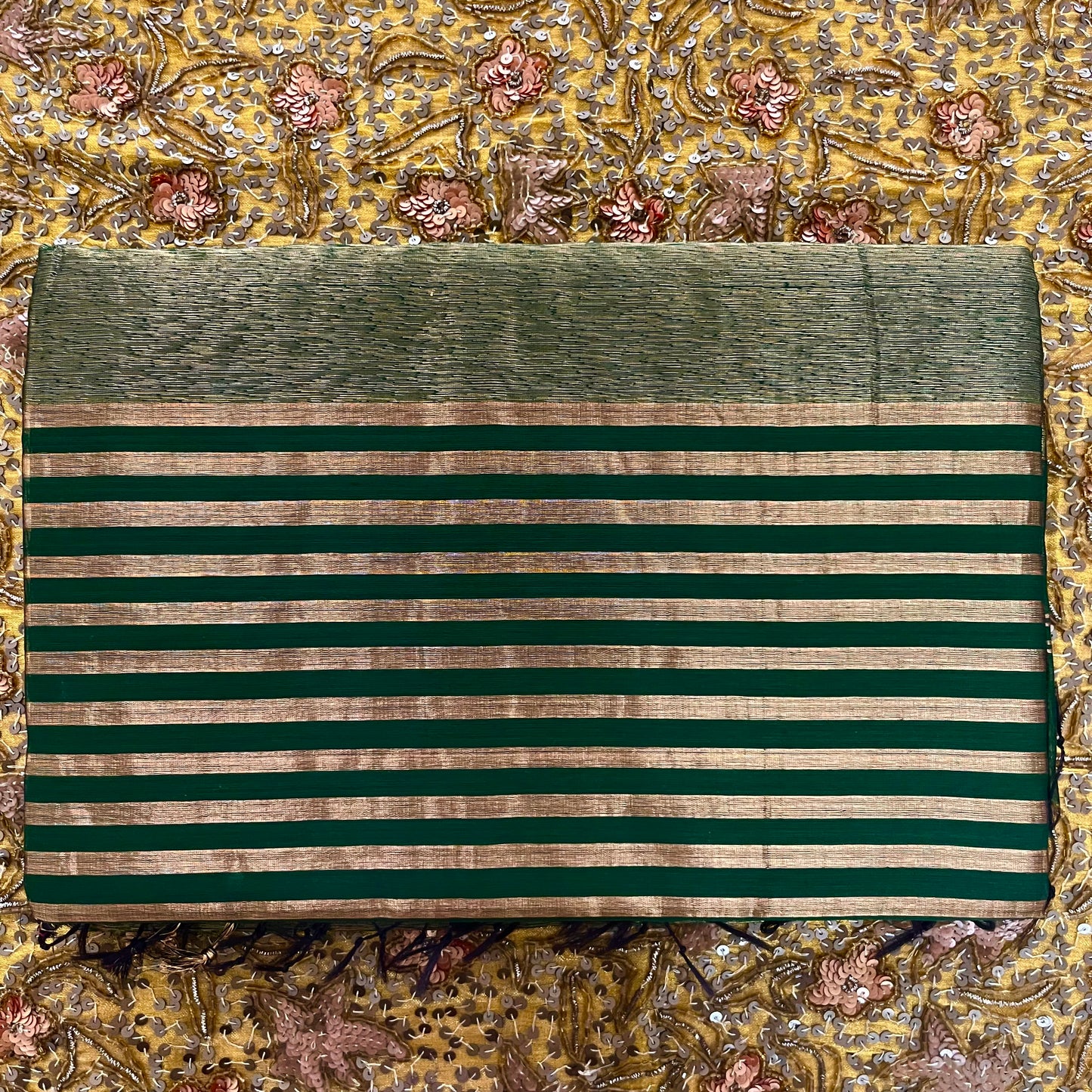 Dark green Maheshwari saree with zari stripes all over