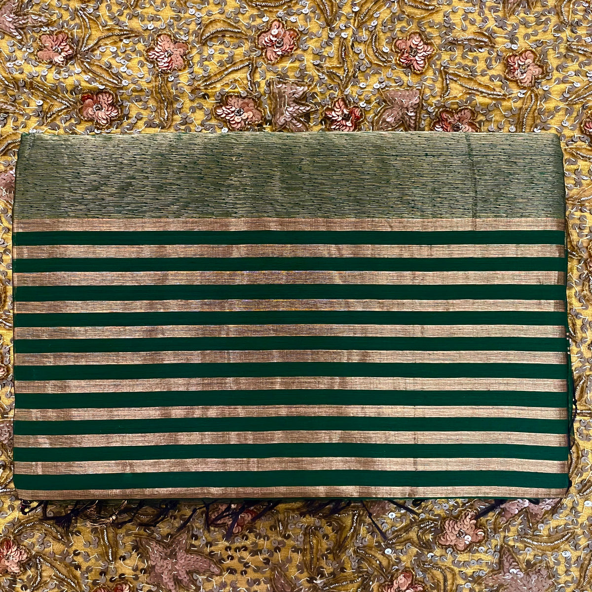 Dark green Maheshwari saree with zari stripes all over