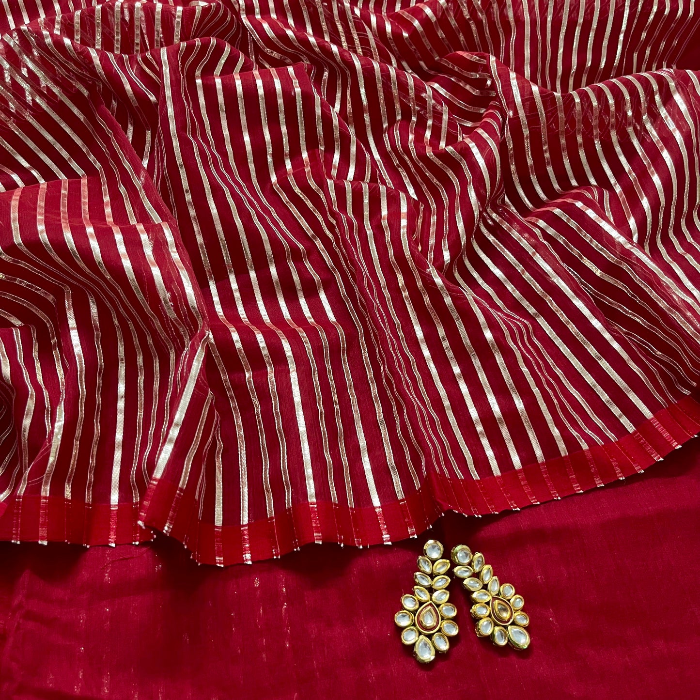 Deep red chanderi saree with intricate gota work all over