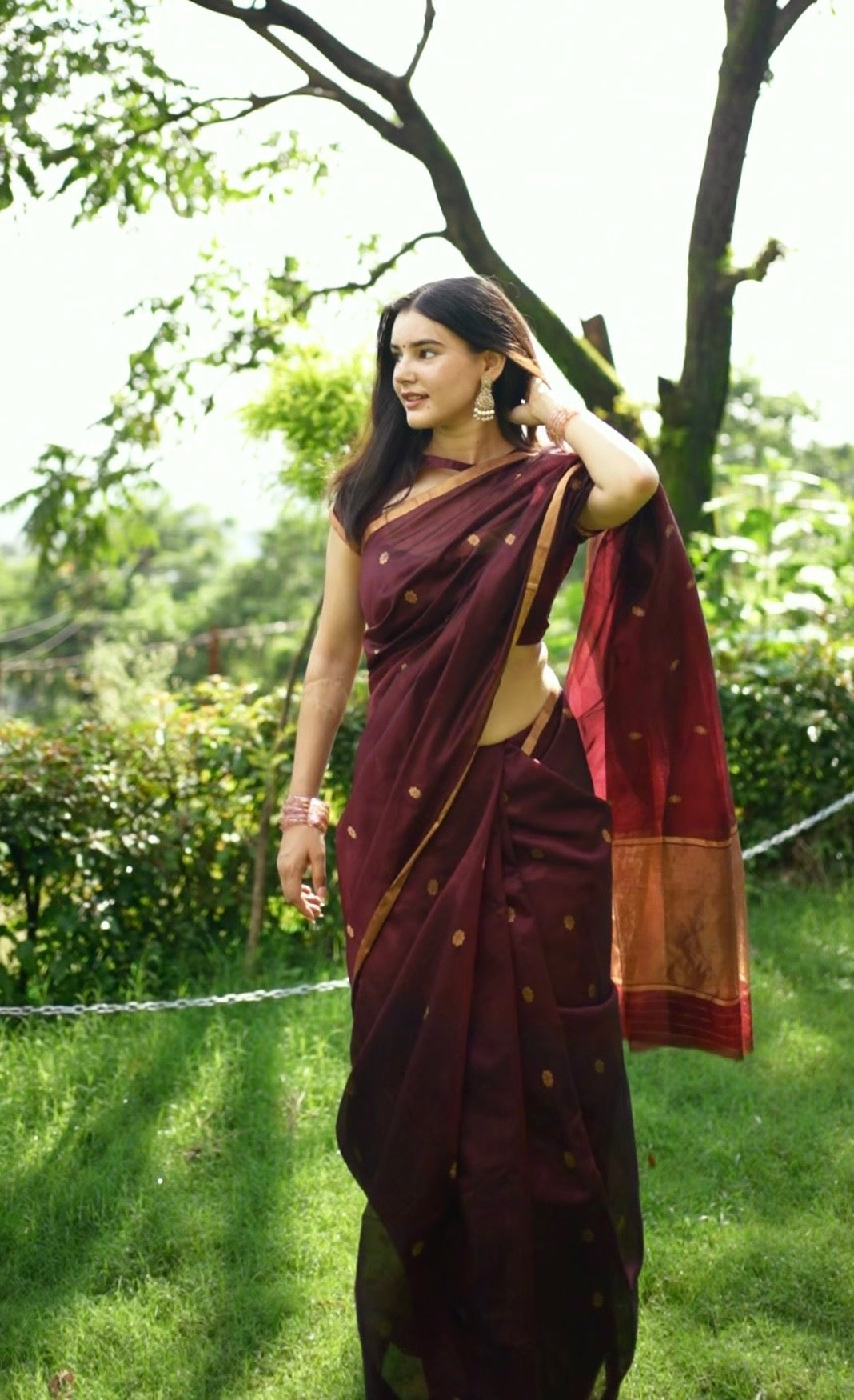 Mahogany Chanderi silk saree with flower bootis all over