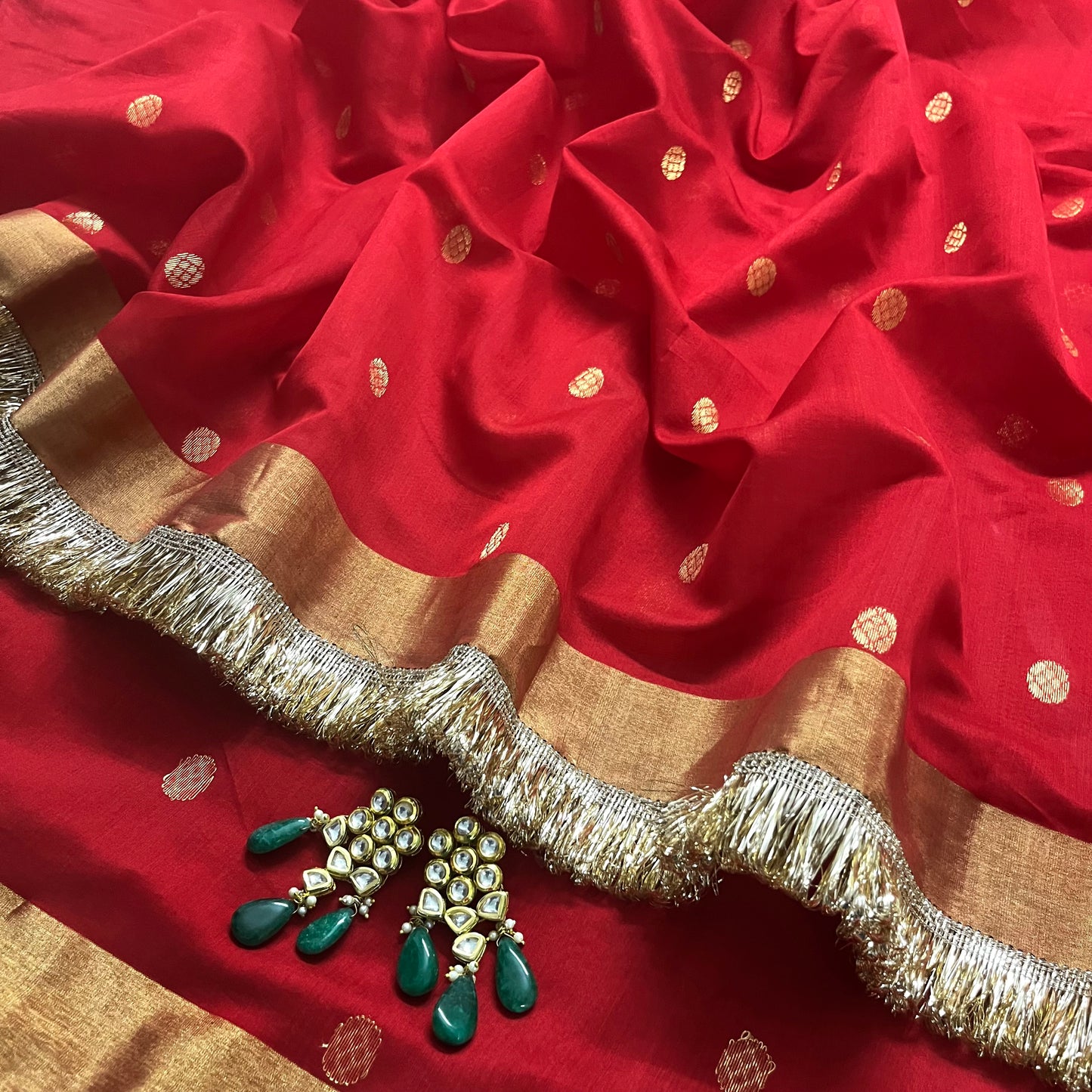 Red Chanderi saree with zari bootis and zari border all over