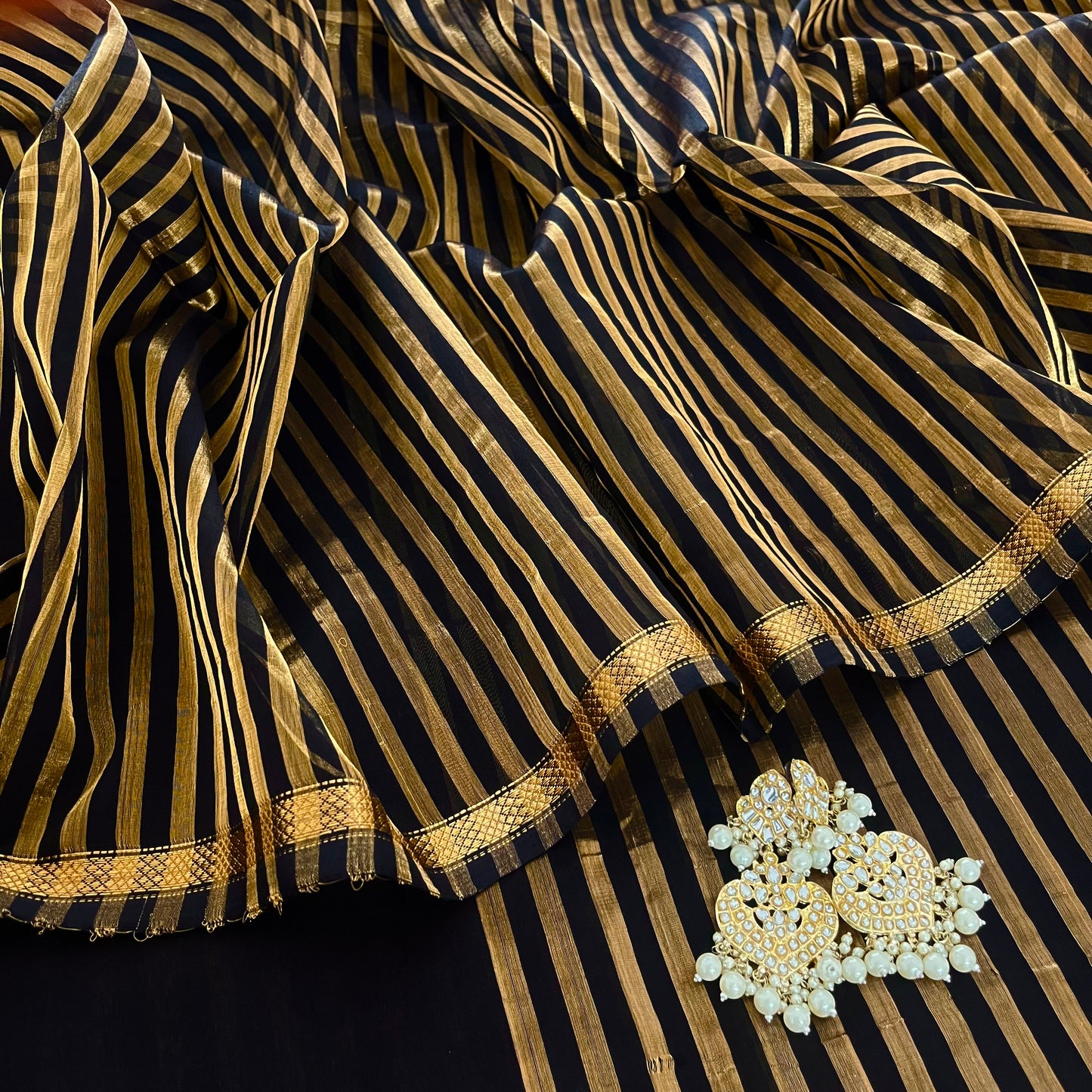 Black Maheshwari saree with zari stripes all over