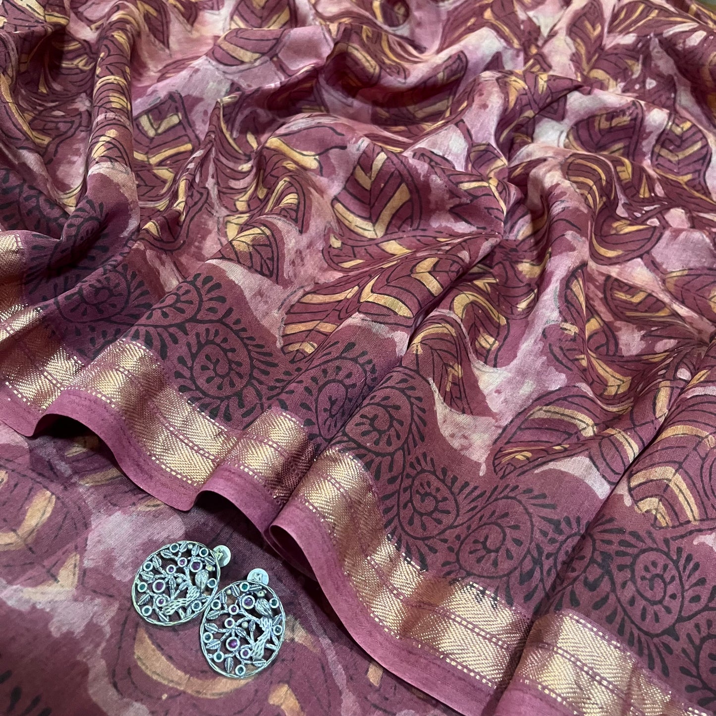 Rust pink Maheshwari saree with ajrakh print all over