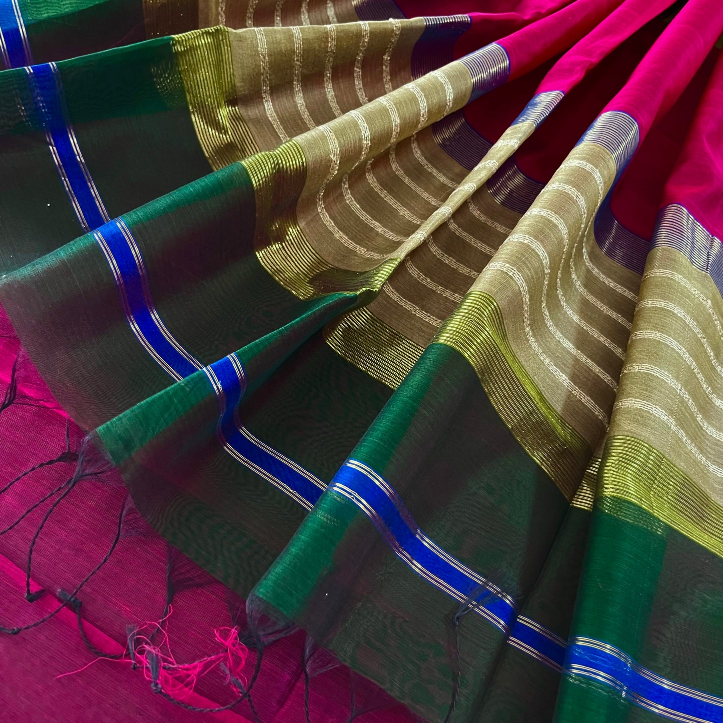 Green and pink Maheshwari saree with zari border