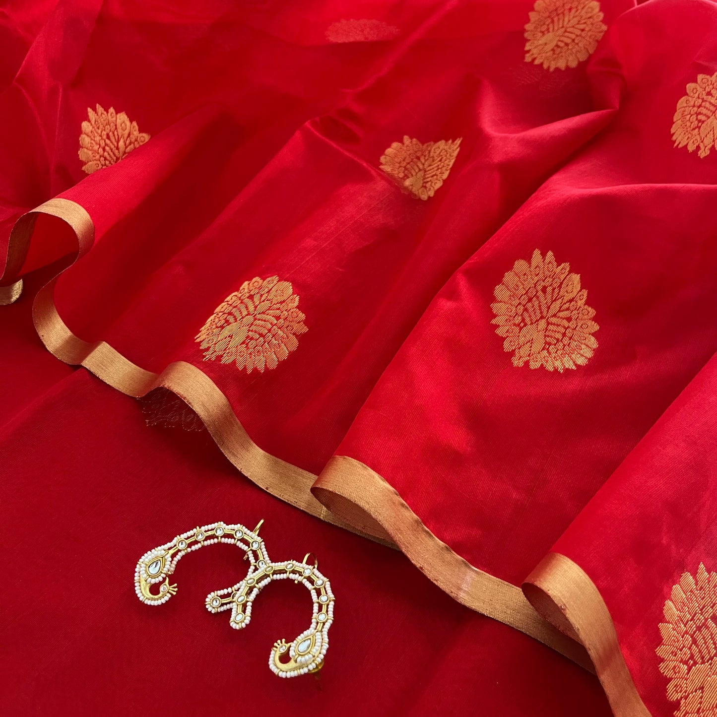 Red Chanderi silk saree with mor motifs all over