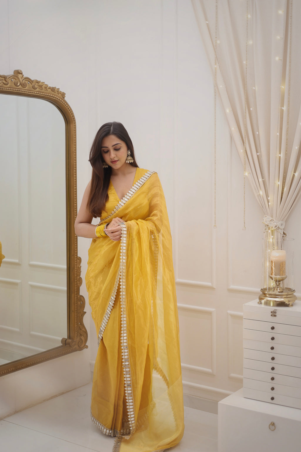 Molten amber gold chanderi tissue silk saree with mirror work border