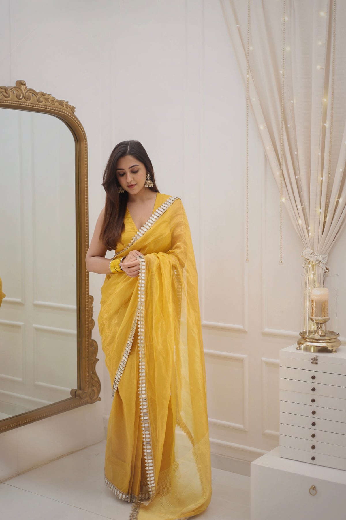 Molten amber gold chanderi tissue silk saree with mirror work border