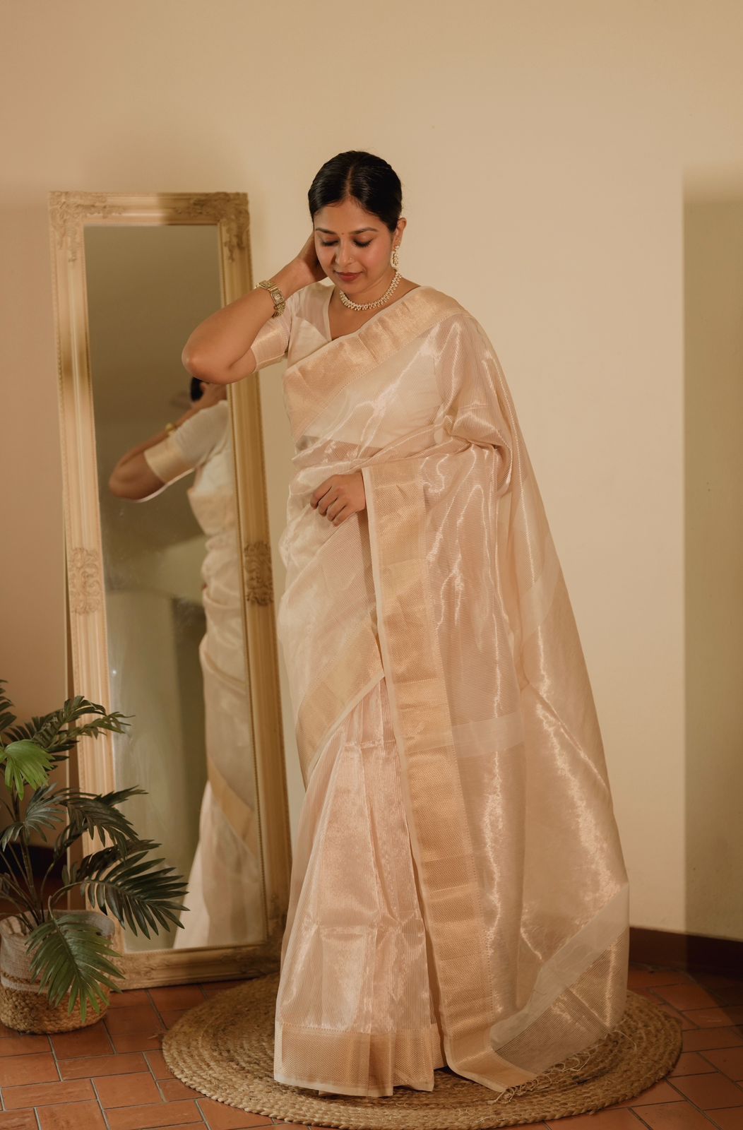 Off white gold Maheshwari saree with zari lines all over