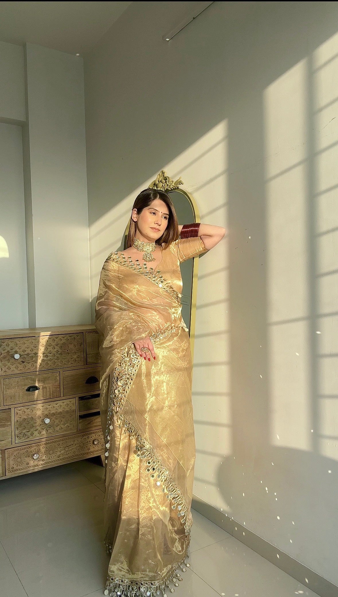 Molten gold chanderi tissue silk saree with dangling mirror work border