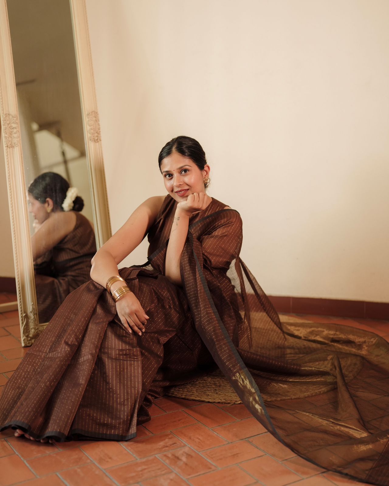 Chocolate brown Maheshwari saree with zari lines all over